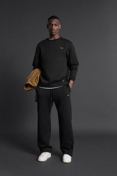 БРЮКИ-ДЖОГГЕРЫ ИЗ ПЛОТНОЙ СИНТЕТИЧЕСКОЙ ТКАНИ — ЧЕРНЫЙ от Zara — изображение 0