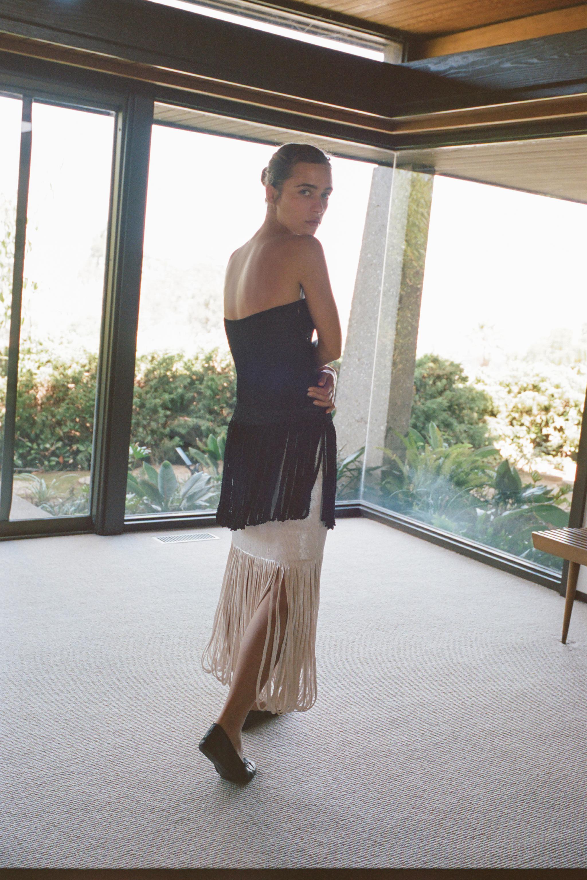 FRINGED STRAIT-ACROSS KNIT TOP