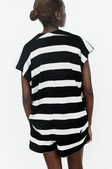 TOP PUNTO ESCOTE PICO - Blanco / Negro de Zara