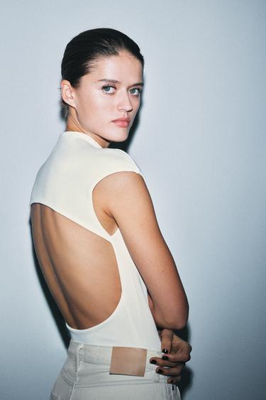 BODYSUIT CO GIÃN CUT OUT - Màu trắng ngà từ Zara