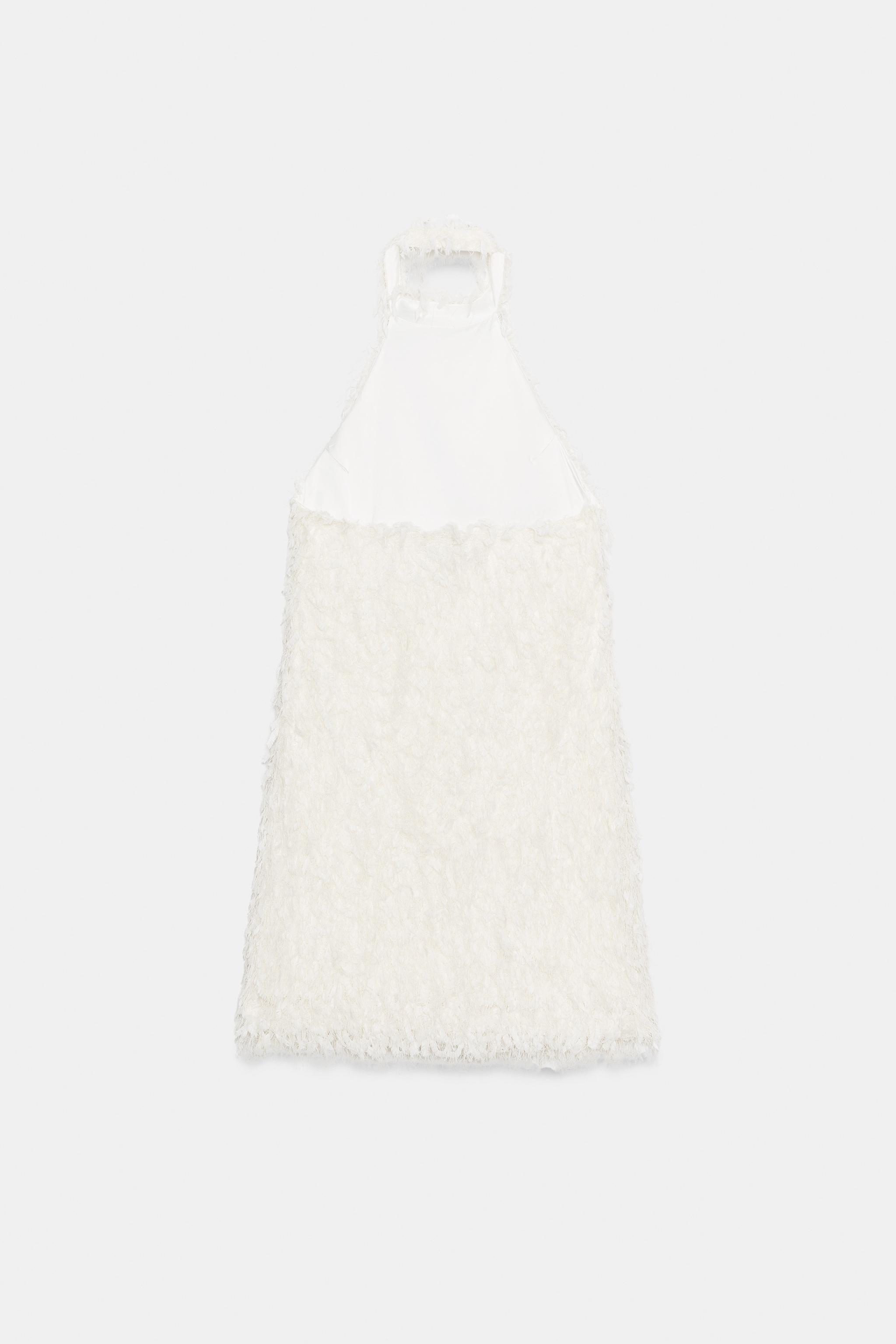 ROBE COURTE EN MAILLE À FRANGES