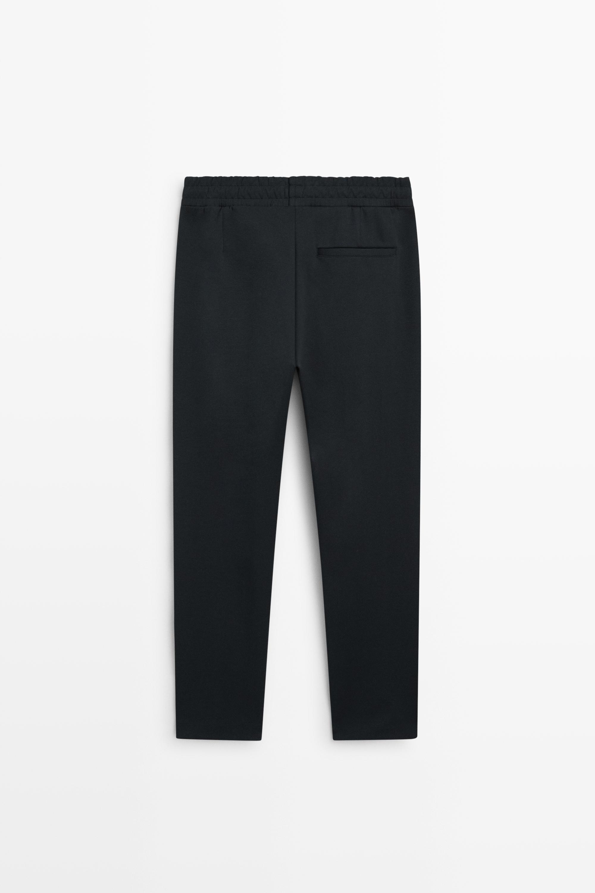 Pantalon à détails de coutures, total look