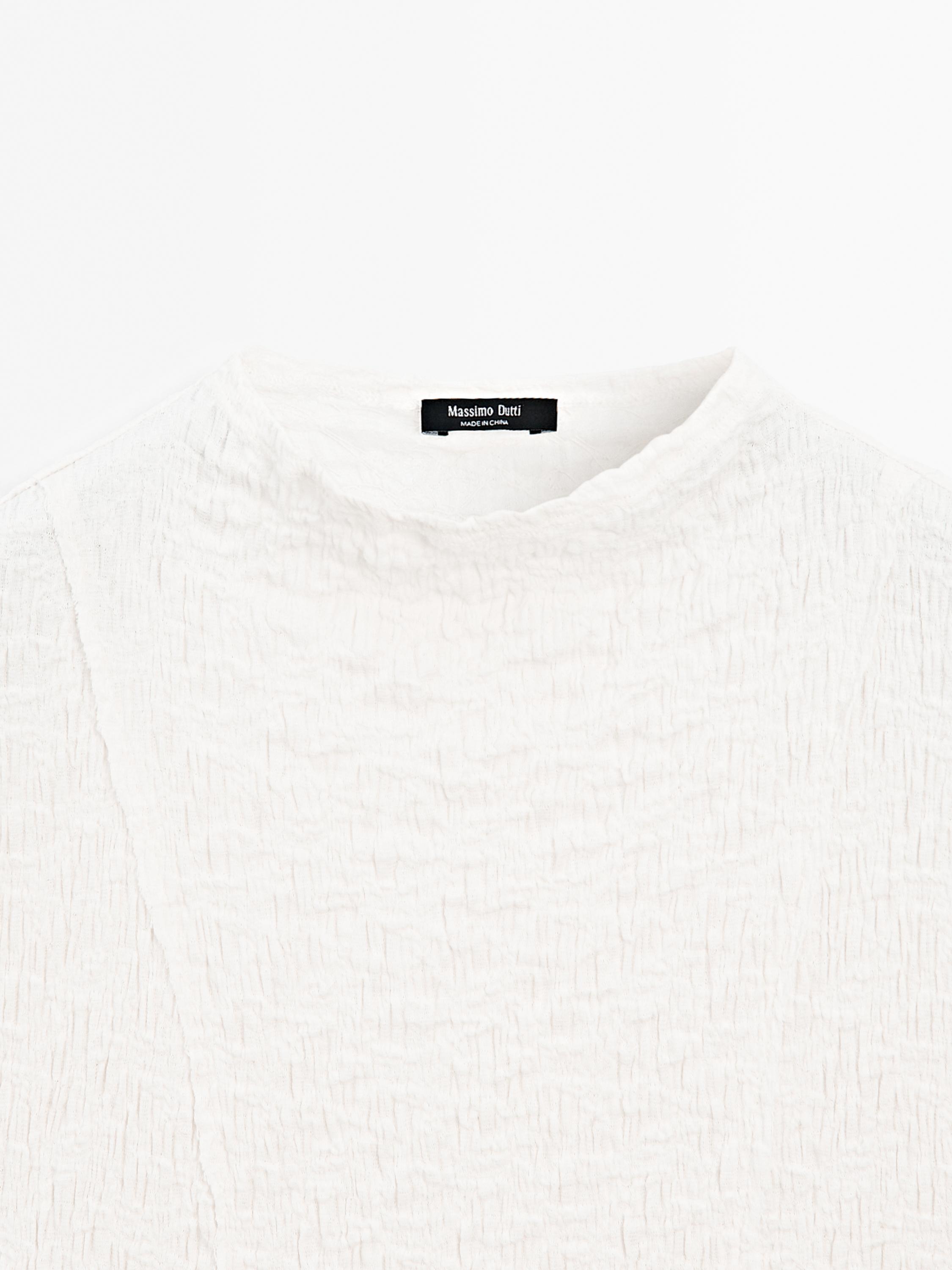 Sleeveless top with gathered detail