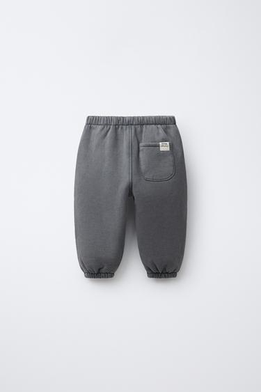 PANTALON DE JOGGING EFFET DÉLAVÉ AVEC ÉTIQUETTE - Gris anthracite de Zara - Image 1