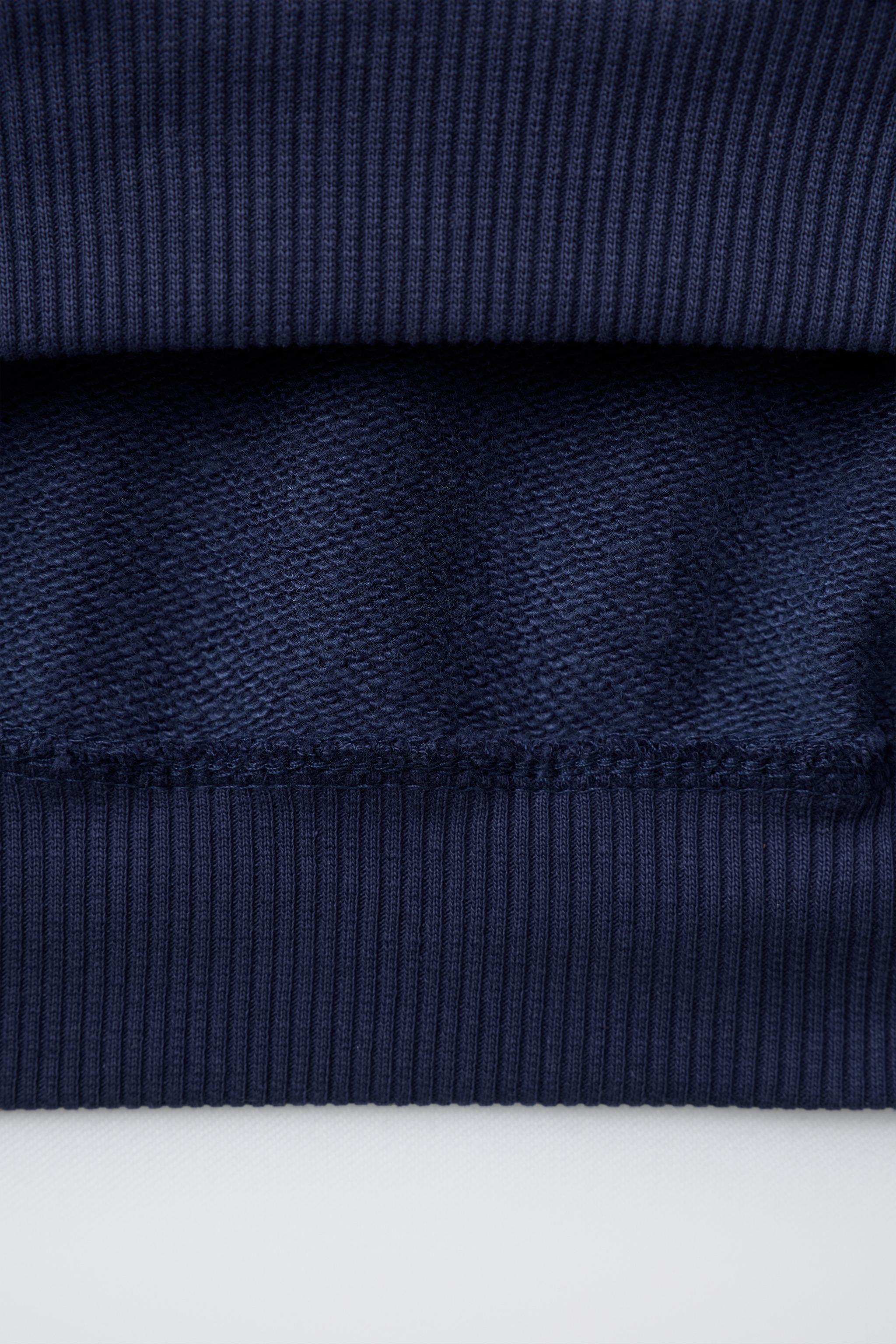 EMBROIDERED ANIMAL STRIPED POLO SWEATSHIRT
