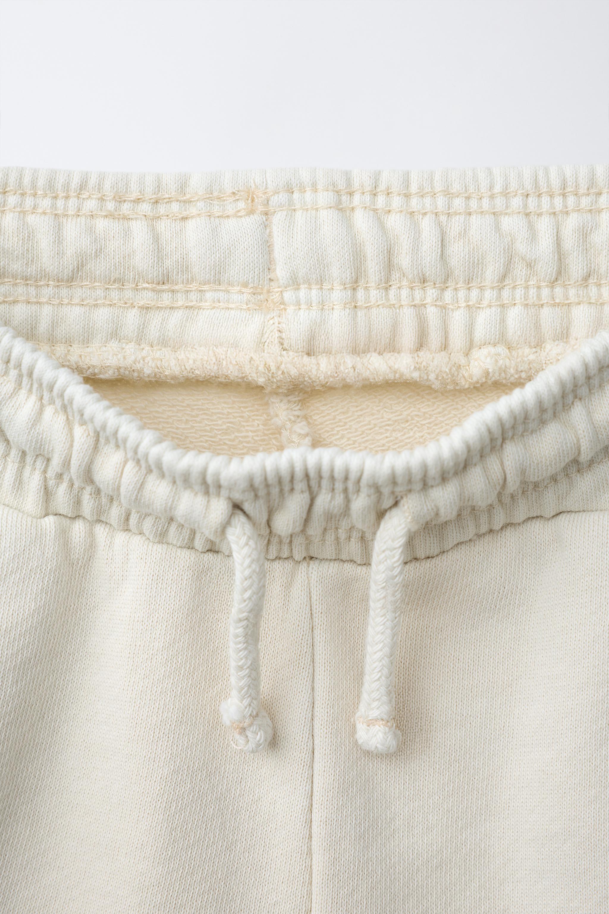 EMBROIDERED GARMENT DYED PLUSH SHORTS