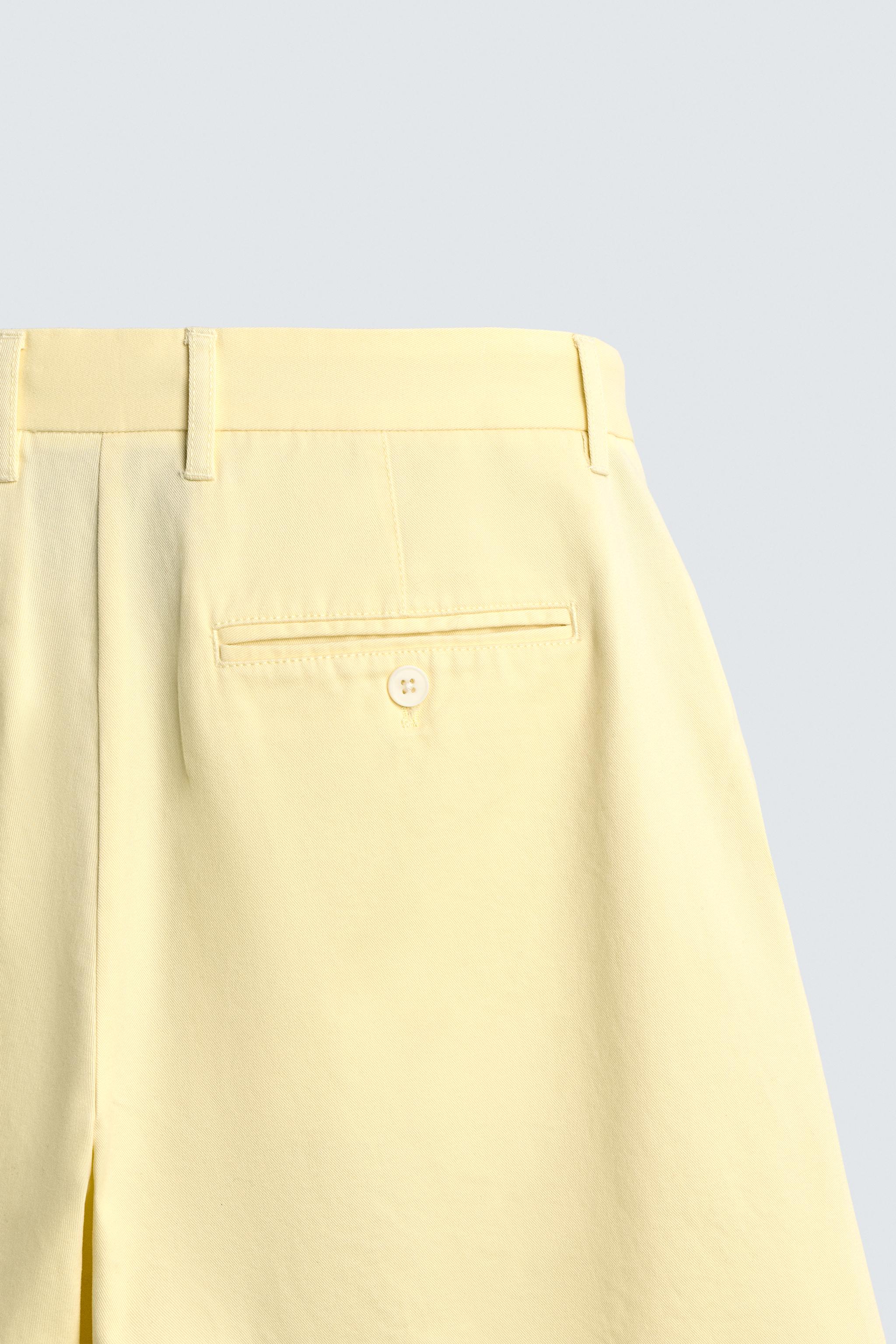 RELAXED FIT PLEATED SHORTS