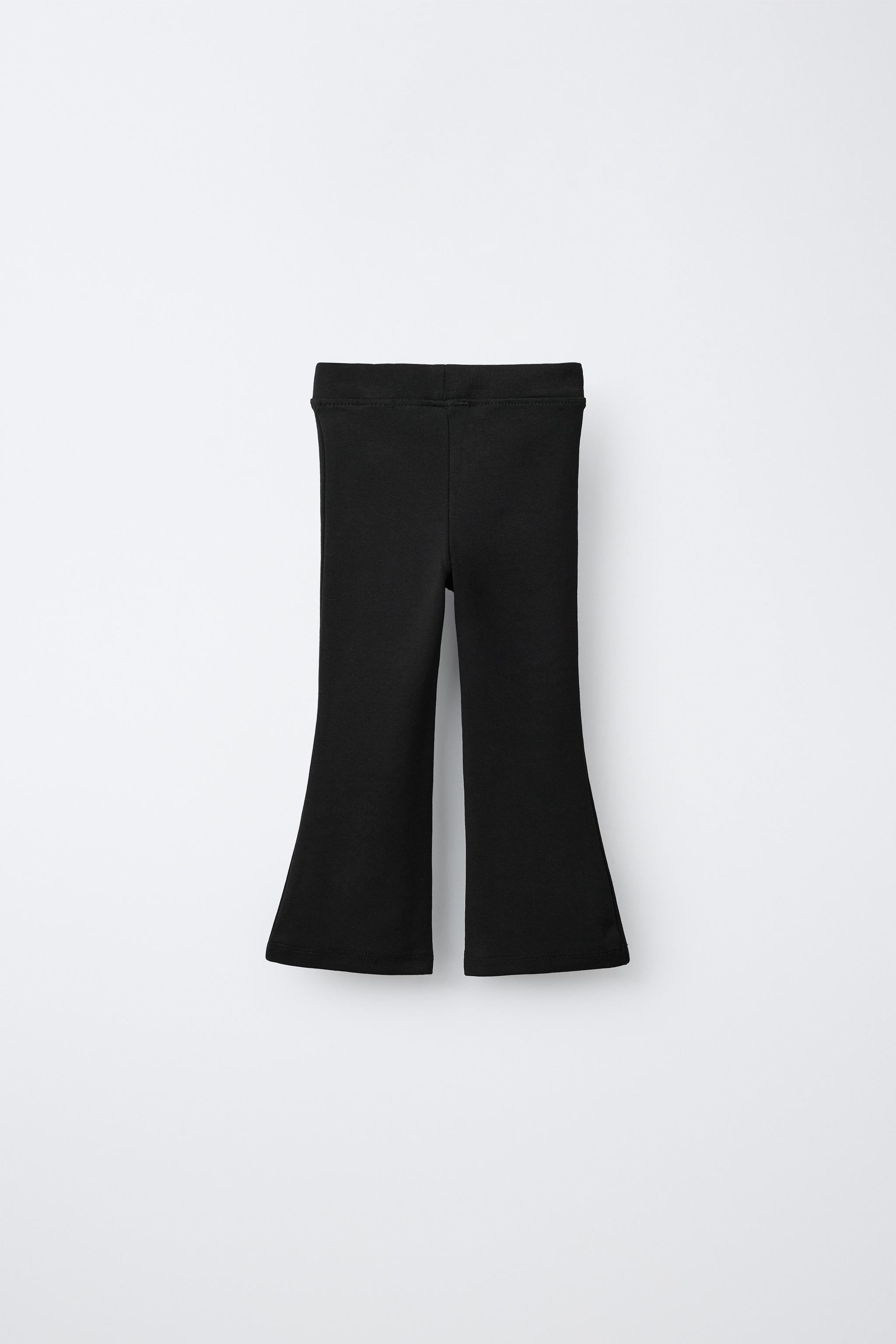 LABEL DETAIL INTERLOCK FLARE LEGGINGS