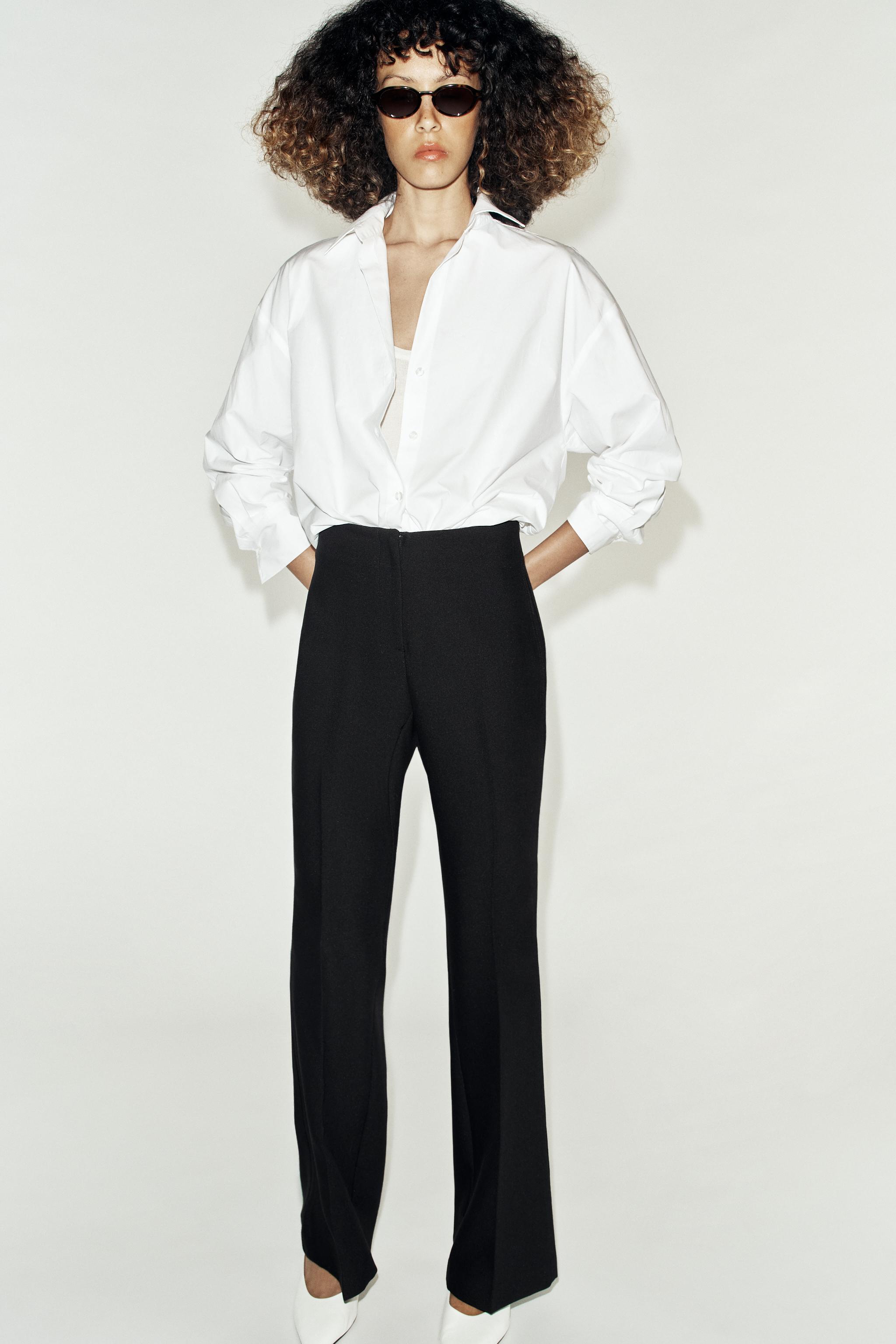 LOW-RISE FLARE PANTS — Black