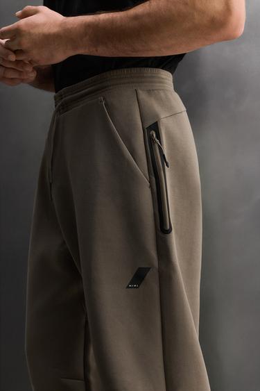 TECHNICAL TROUSERS WITH ZIPS - Sand by Zara - Image 4