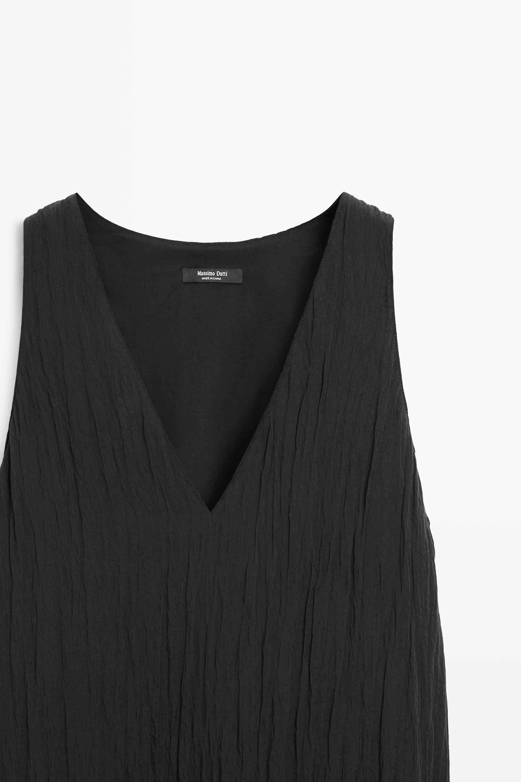 Robe midi fluide plissée