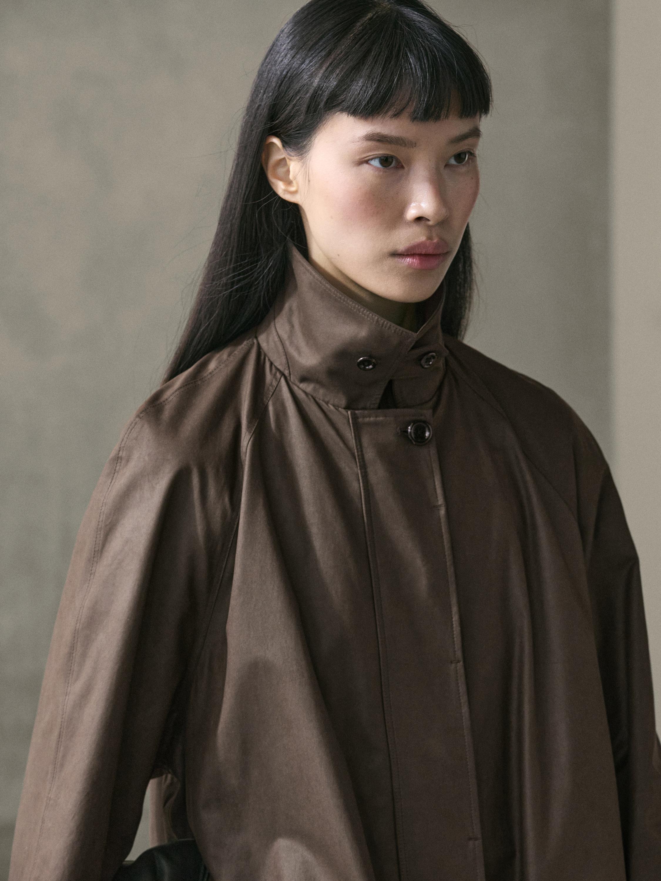 Long parka with pocket details