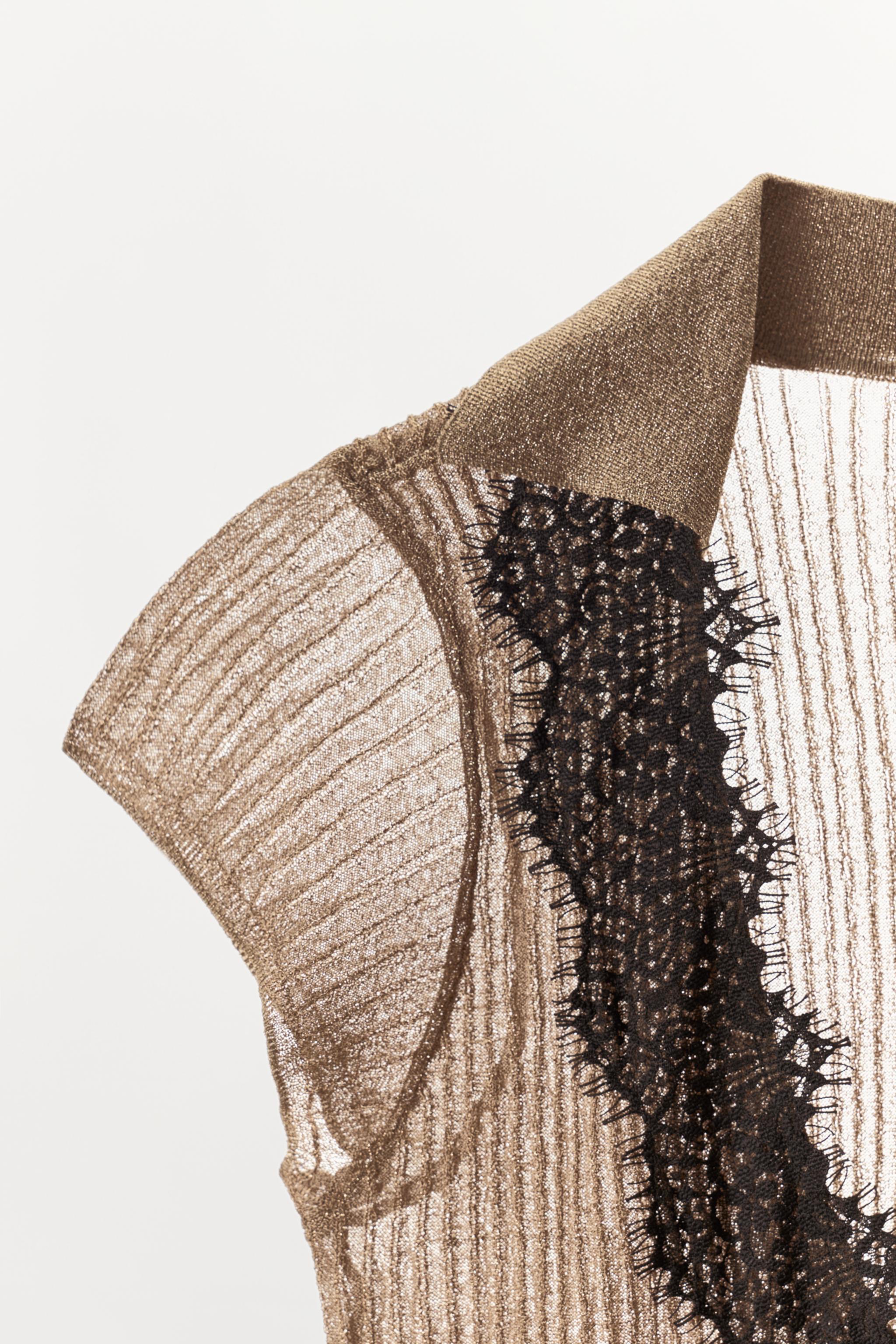 METALLIC YARN KNIT TOP WITH LACE