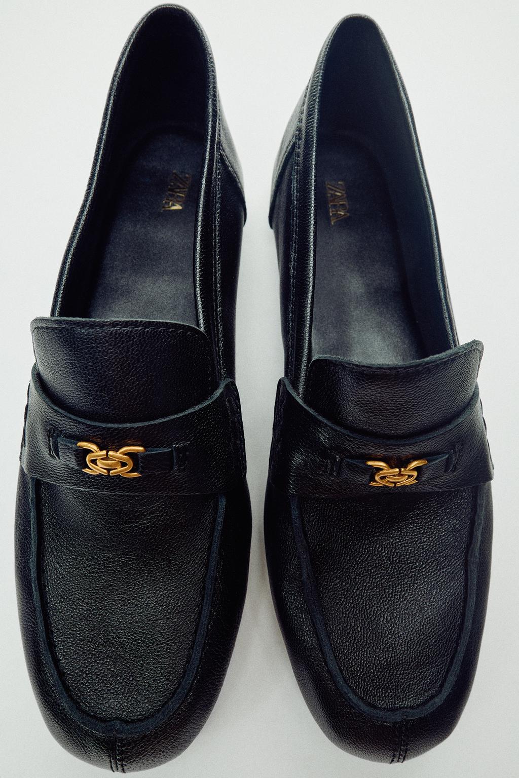 LEATHER LOAFERS WITH METAL APPLIQUÉ