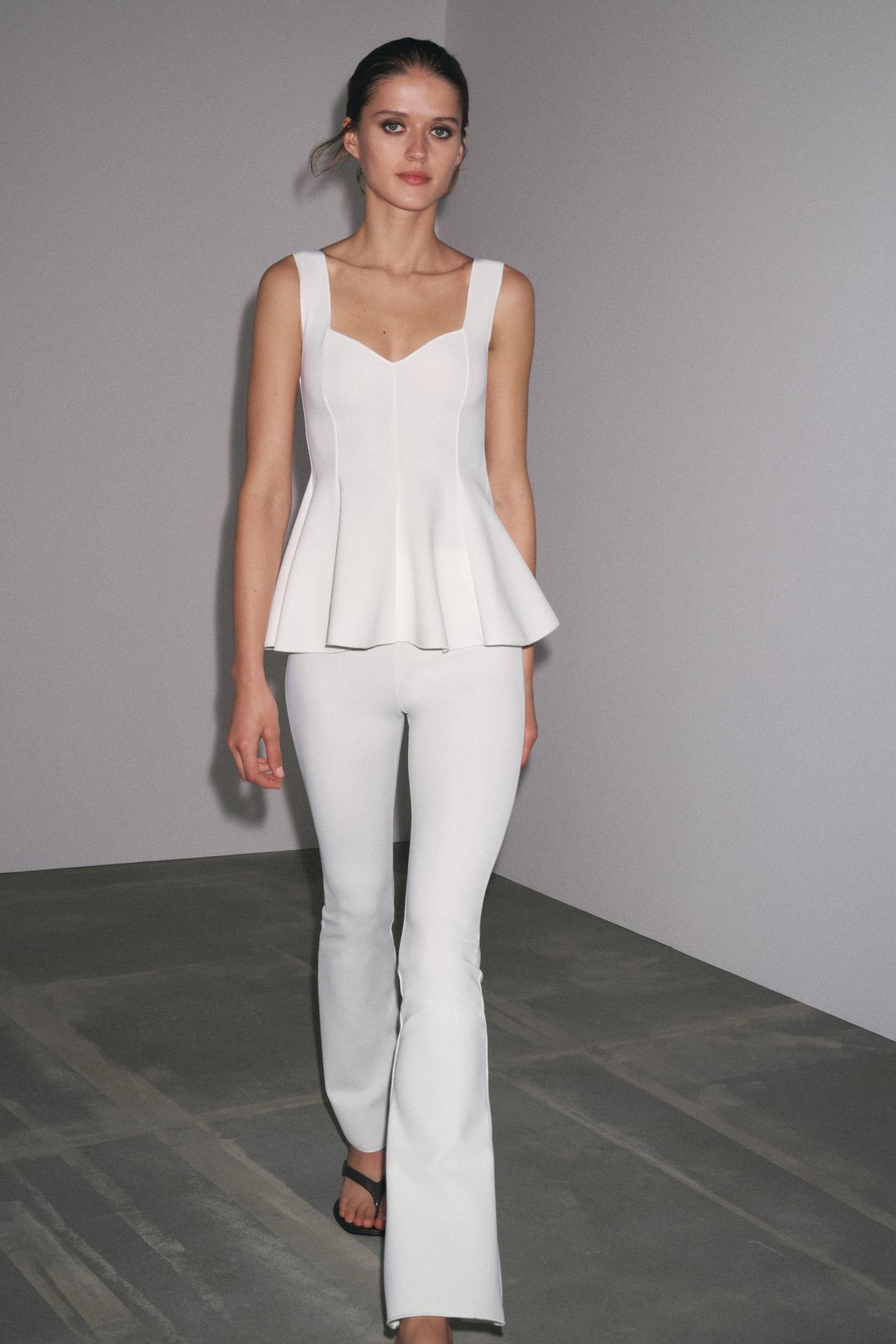PEPLUM STRETCH TOP