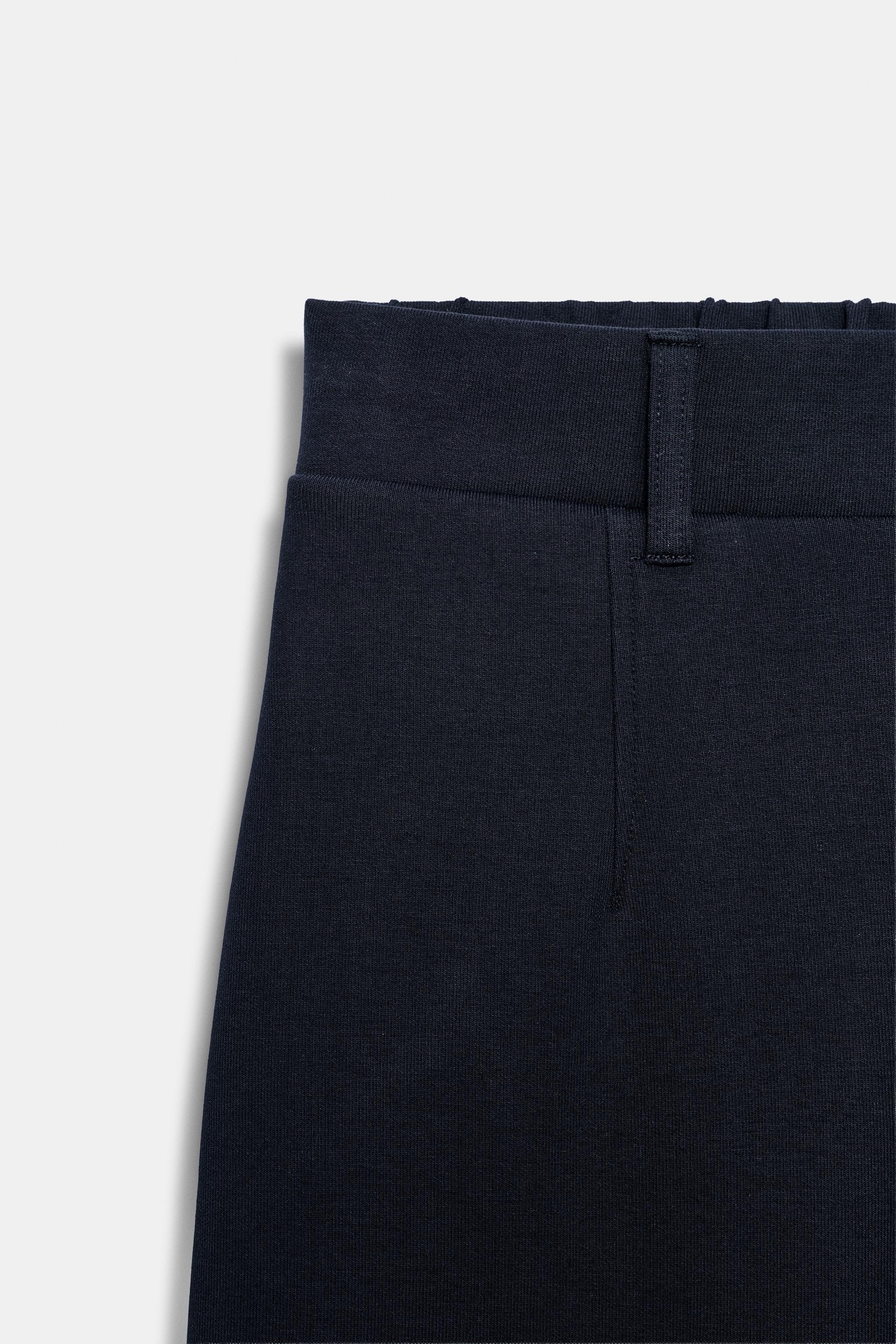 PANTALON À PINCES EN INTERLOCK