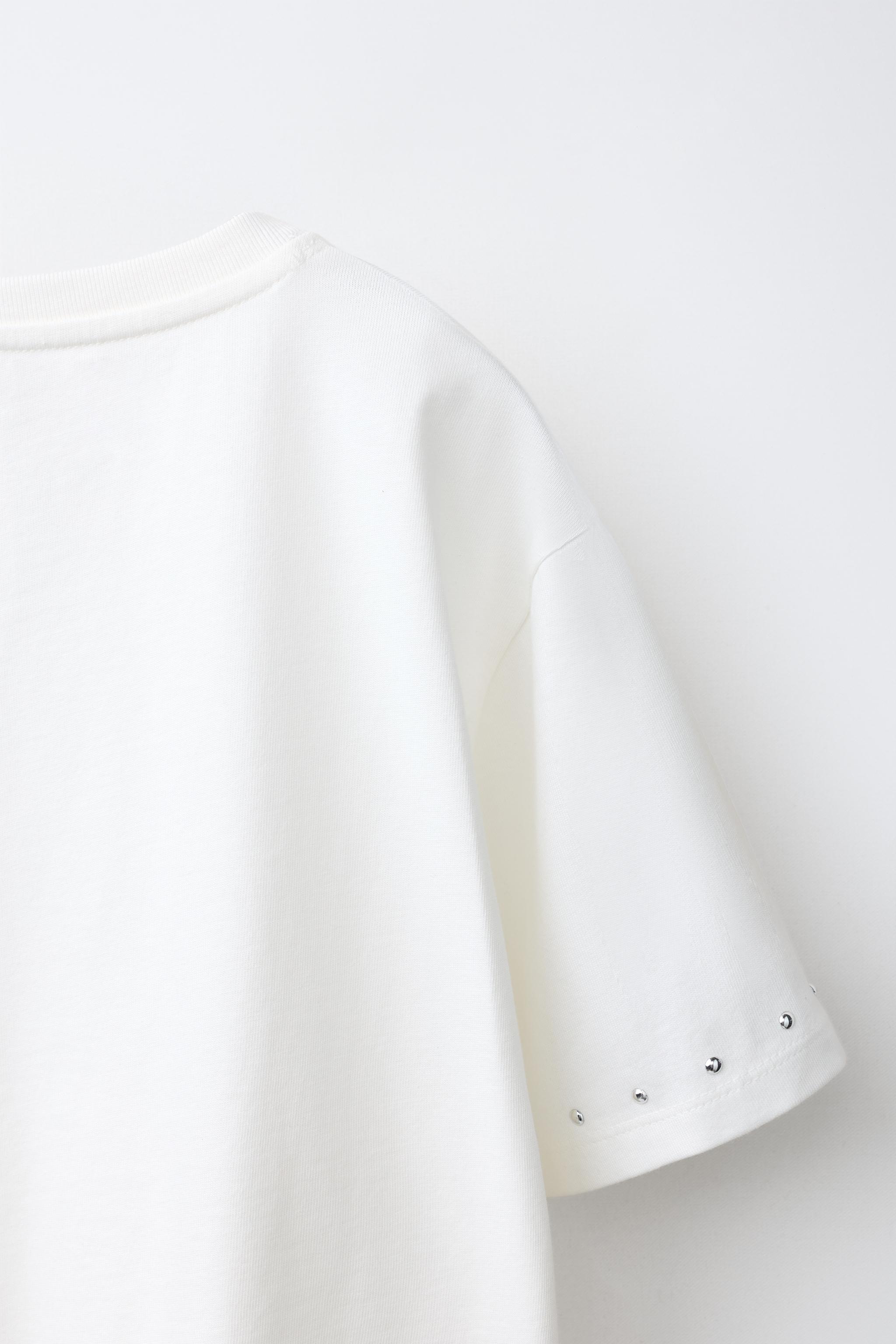 T-SHIRT À FRANGES ET CLOUS