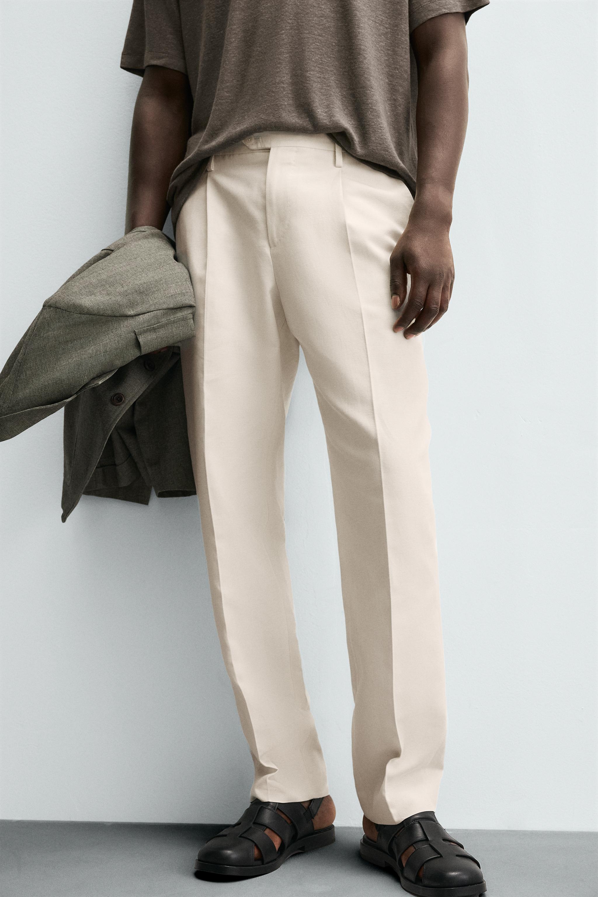 REGULAR FIT PLEATED TROUSERS - Ecru | ZARA South Africa