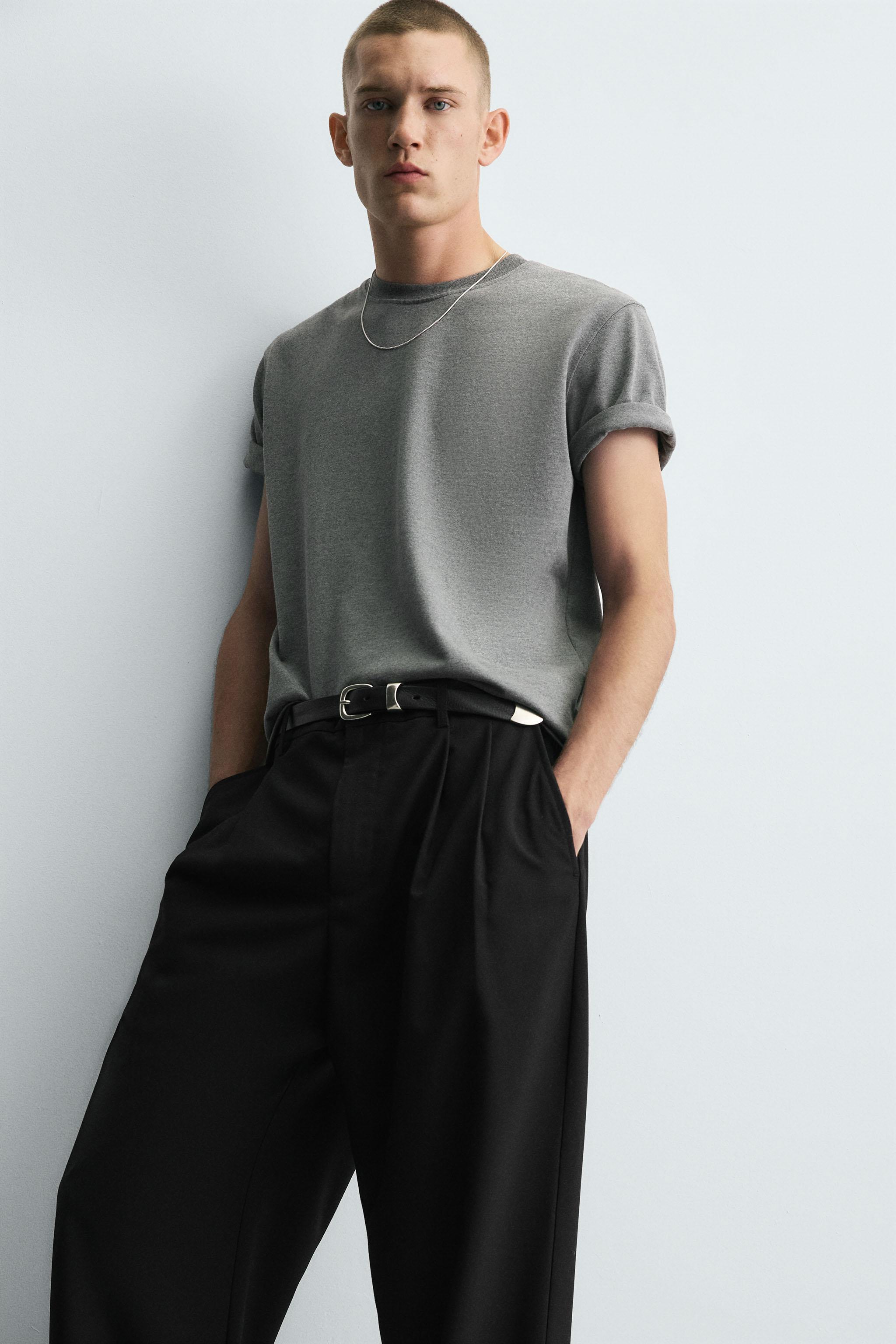 WIDE-LEG PLEATED TROUSERS