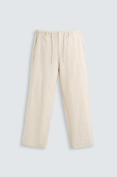 Zara COTTON - LINEN EMBROIDERED CUT-OUT PANTS - Light beige
