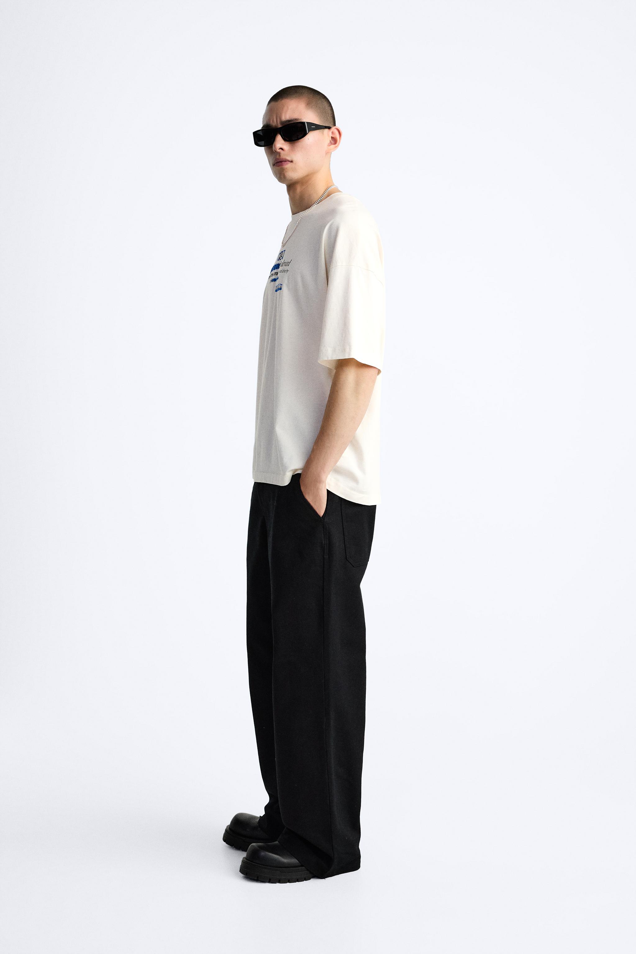 men in white tees