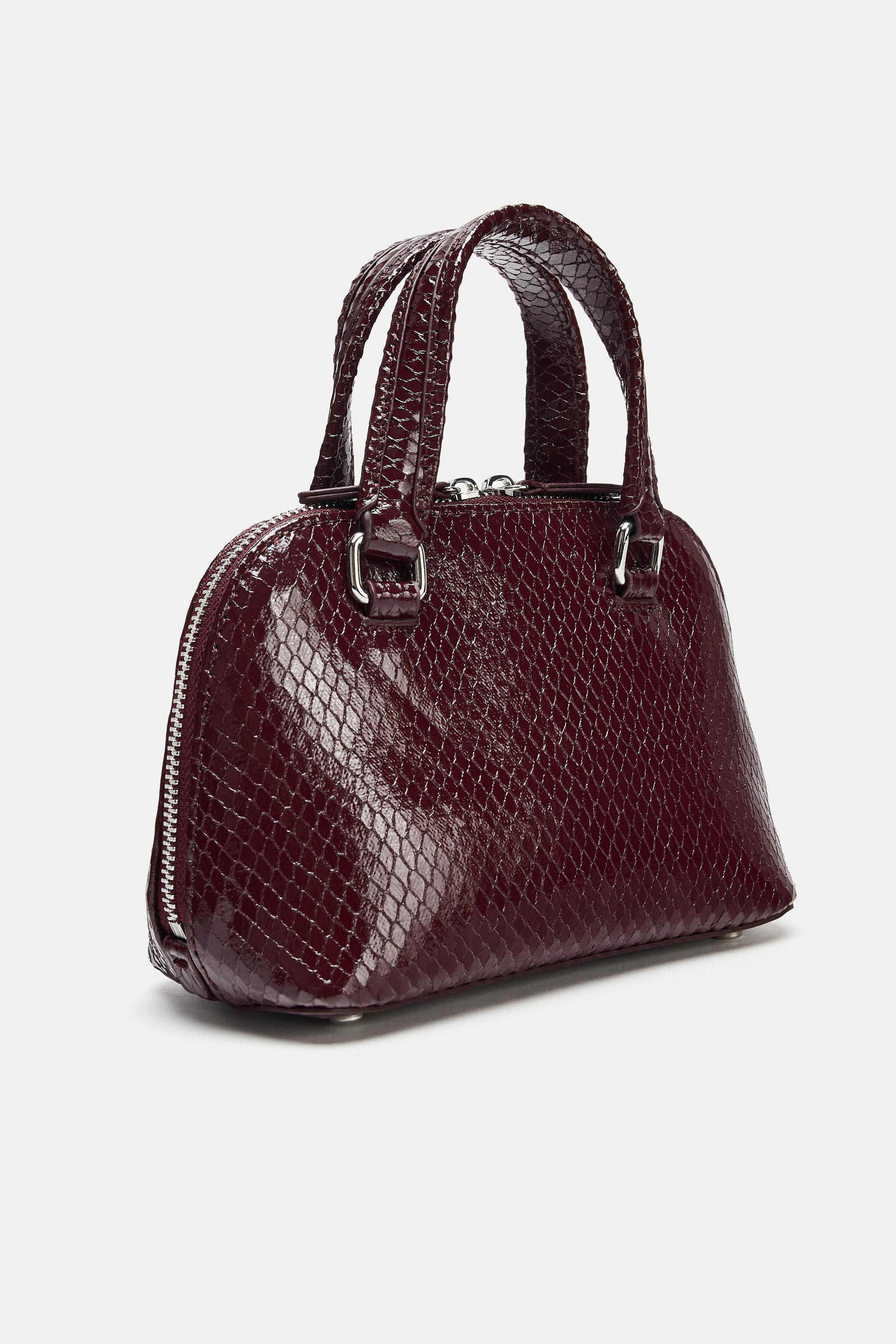 EMBOSSED MINI CITY BAG