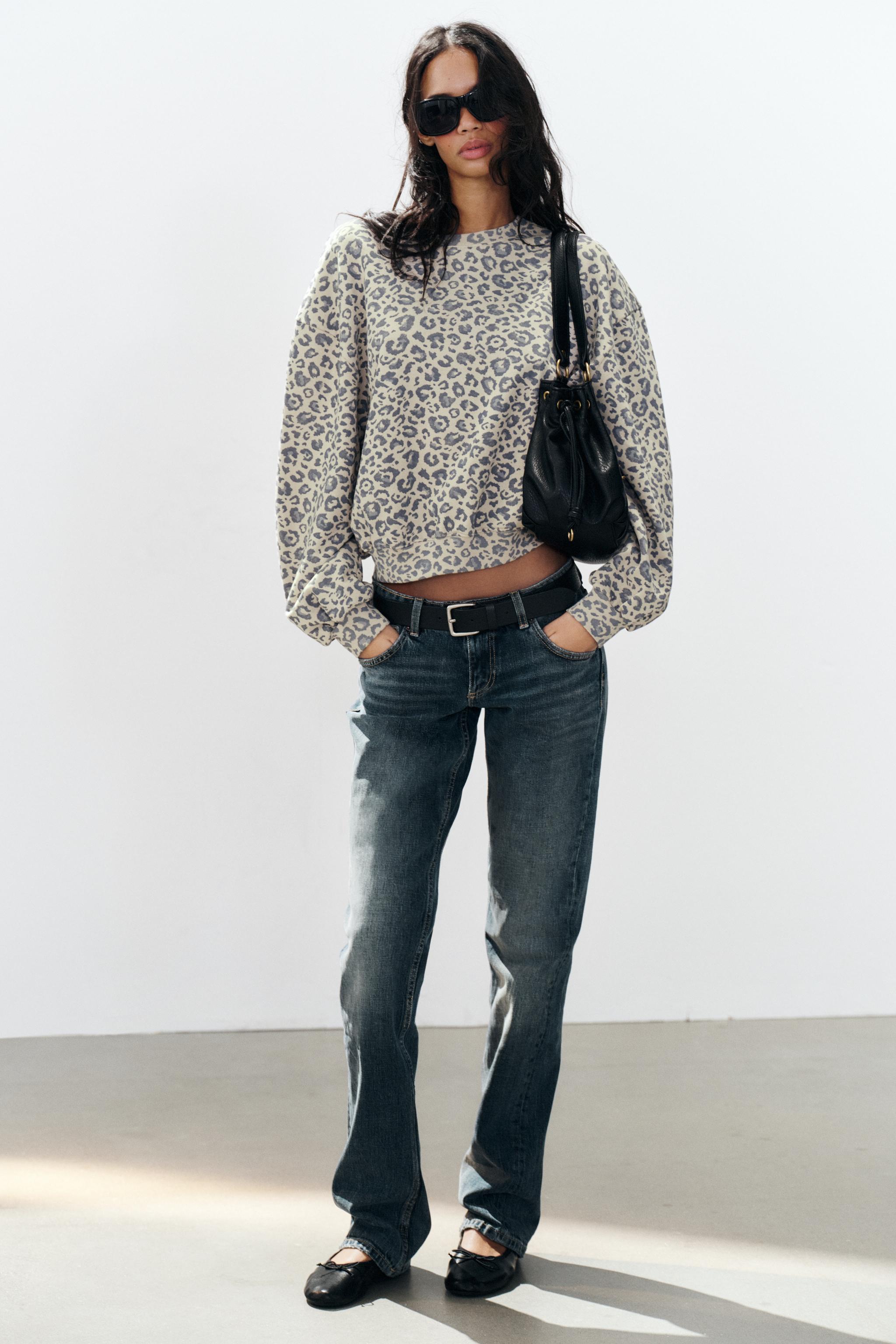ANIMAL PRINT SWEATSHIRT