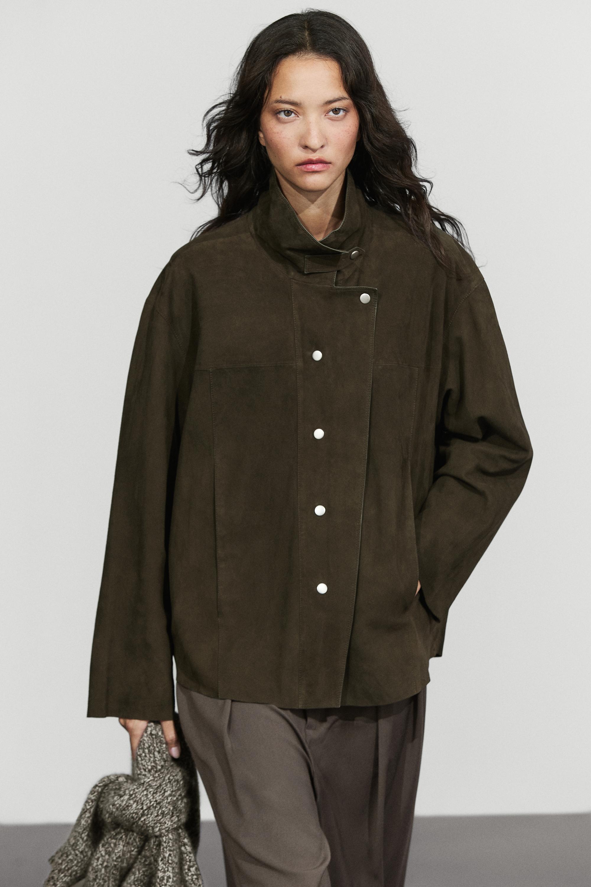 Veste col montant en cuir et daim