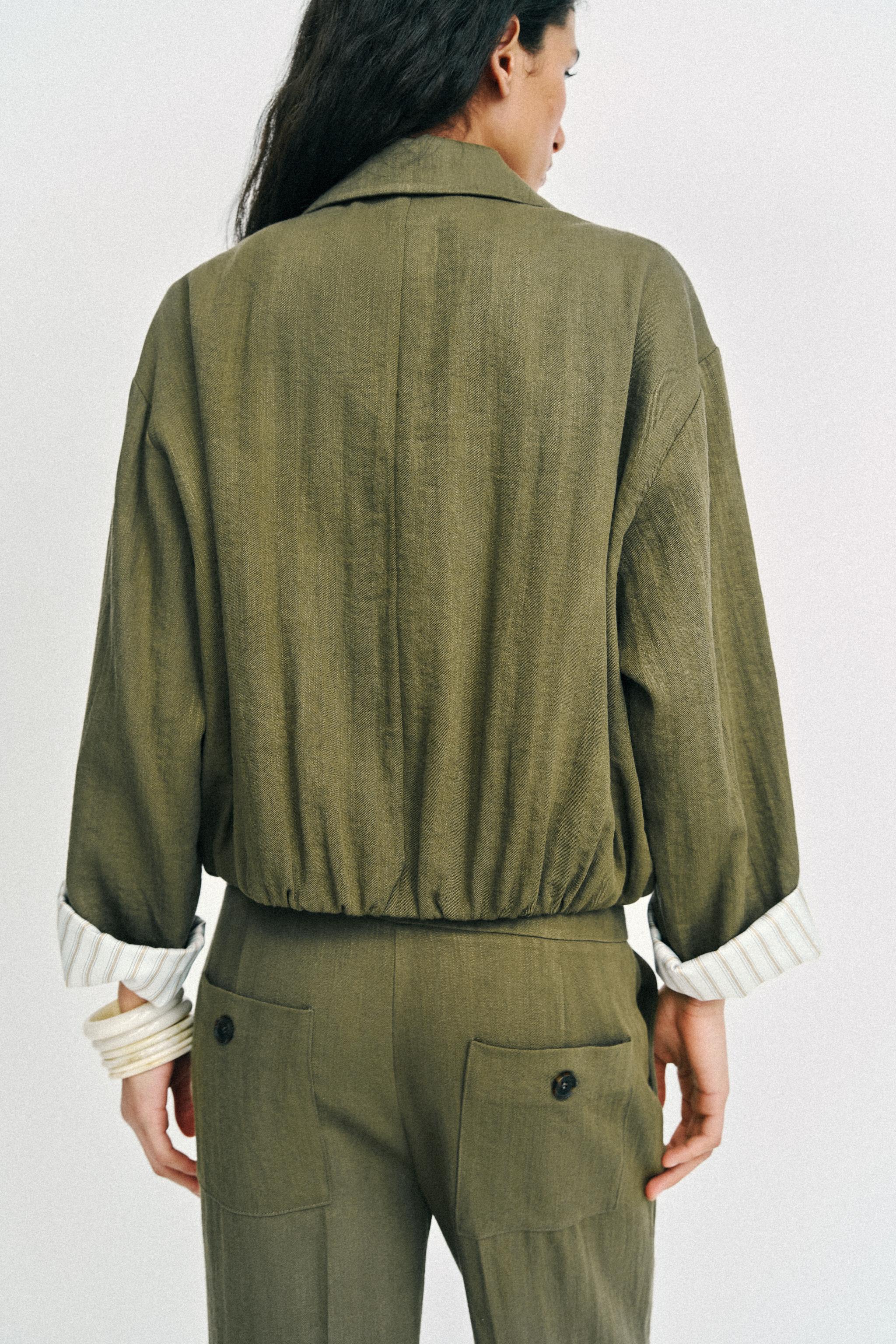 VESTE COURTE MANCHES RETROUSSÉES