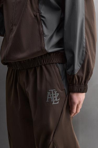 COLOUR BLOCK FOOTBALL TECHNICAL TROUSERS - Burgundy by Zara