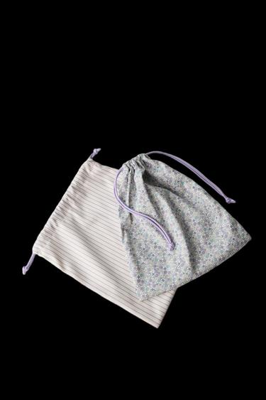 PACK BOLSAS DE VIAJE FLORES - Violeta Malva de Zara