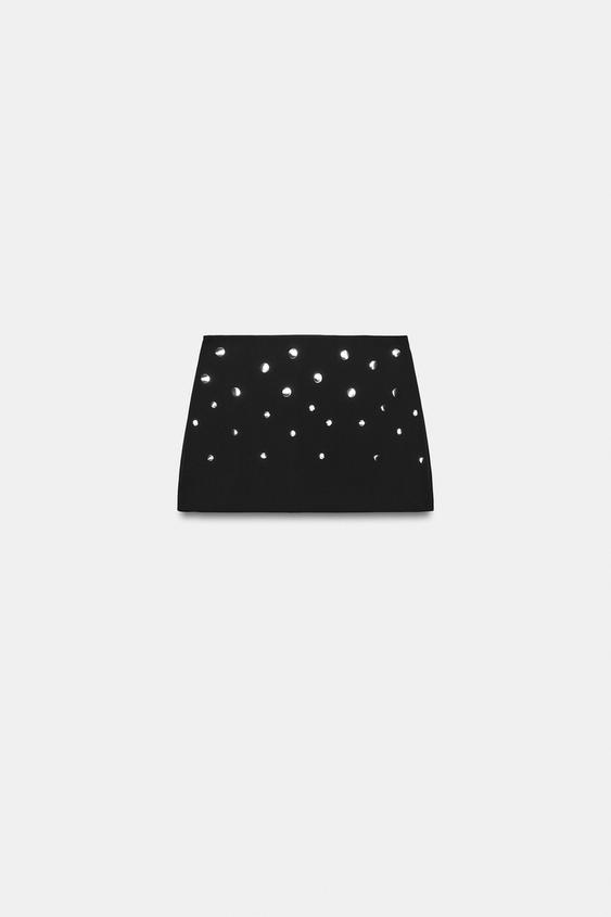 FALDA MINI TACHAS - Negro de Zara - Imagen 0