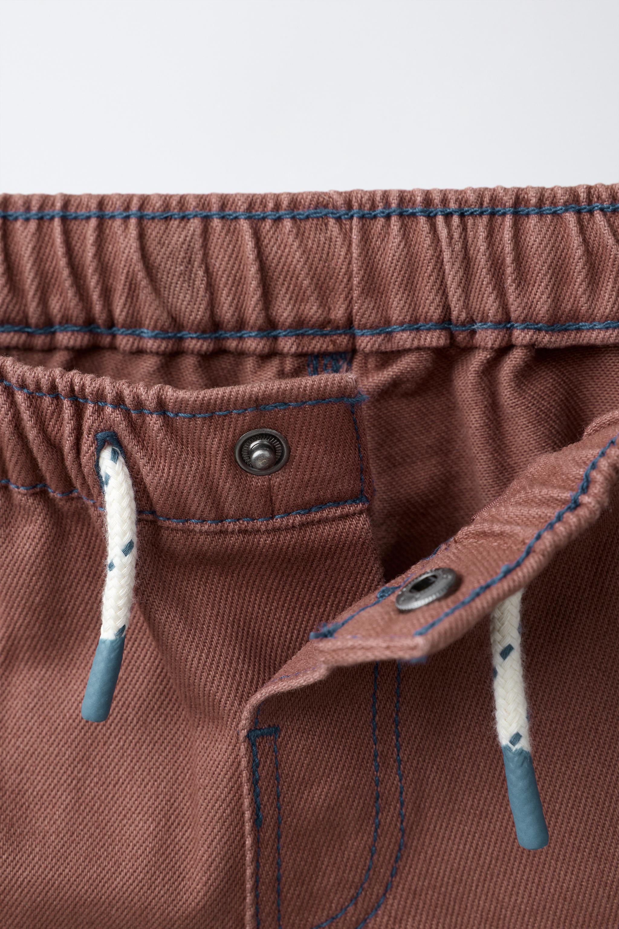 CONTRAST STITCHING SHORTS