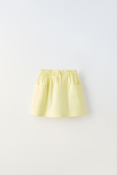 ЮБКА МИДИ TRUE NEUTRALS ИЗ ПОПЛИНА — ПАСТЕЛЬНО-ЖЕЛТЫЙ от Zara — изображение 0