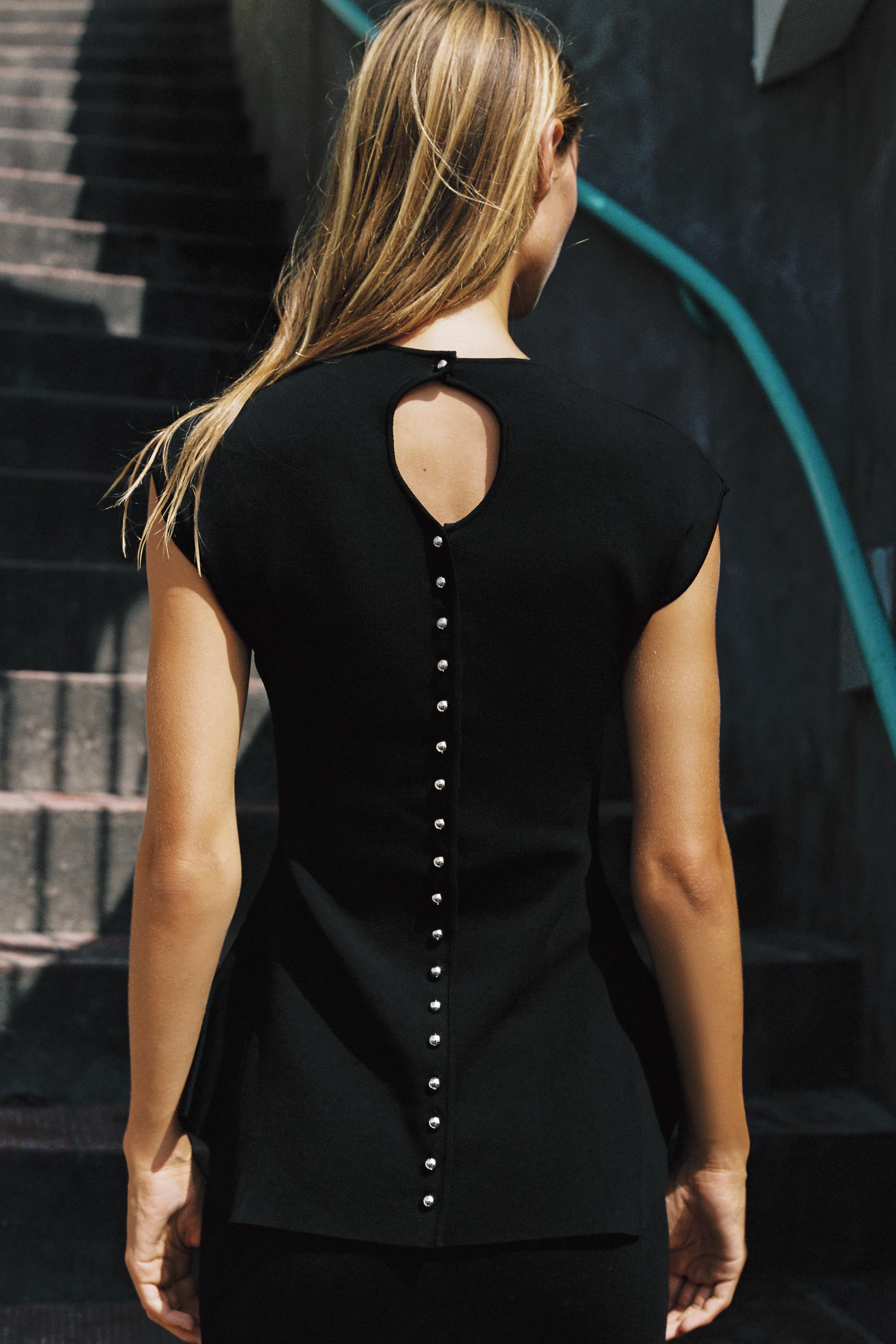 KNIT PEPLUM TOP — Black