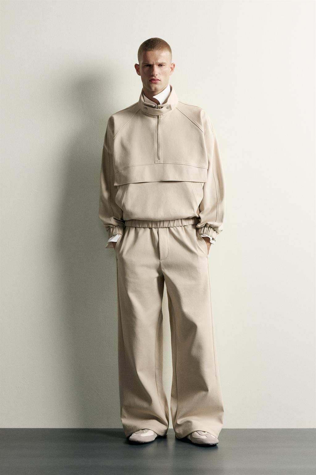 TECHNICAL WIDE-LEG TROUSERS