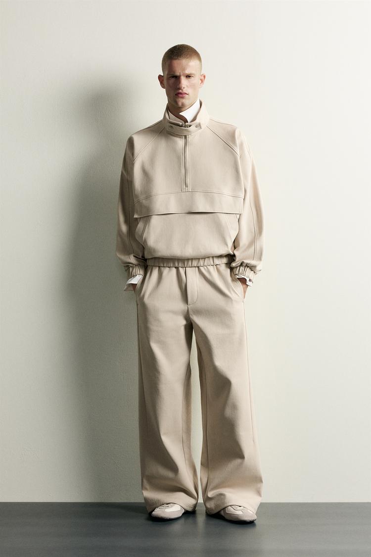 TECHNICAL WIDE-LEG TROUSERS