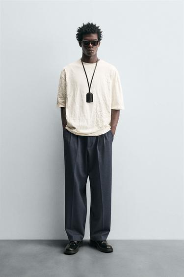 PANTALÓN WIDE FIT PLIEGUES - Marino de Zara - Imagen 0