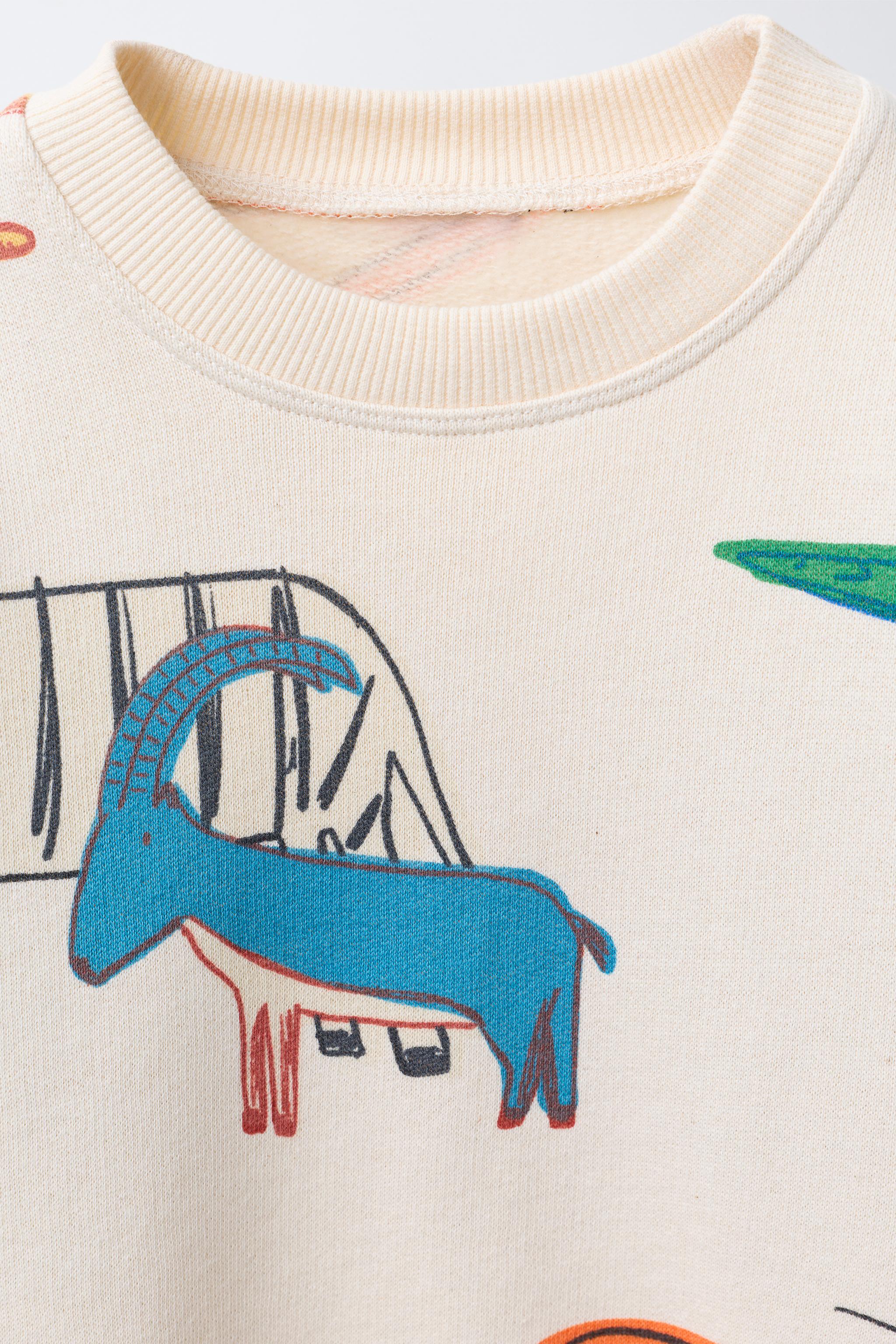 JOGGING SET: SWEATSHIRT AND ANIMAL PRINT JOGGER PANTS