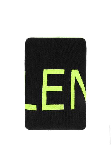 Black knitted accessory on a white background with the text LEN in large neon green letters. Minimalist and modern style.