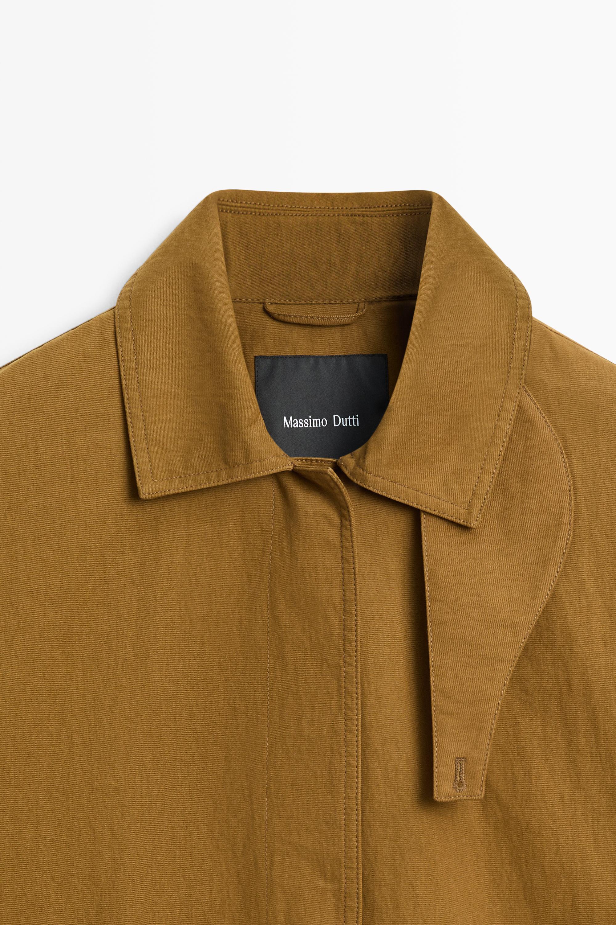 Button-tab cape jacket