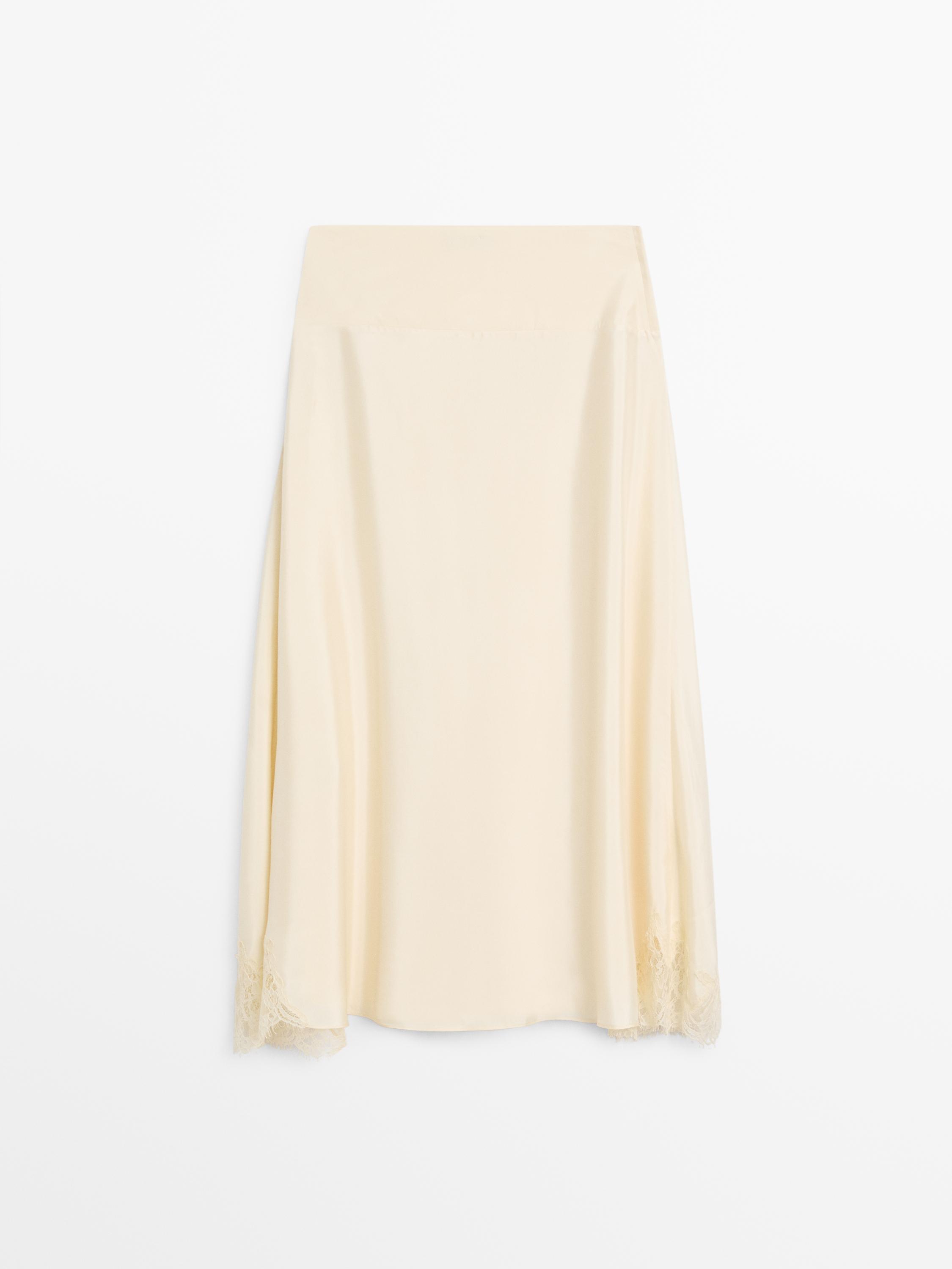Jupe asymétrique détail lingerie