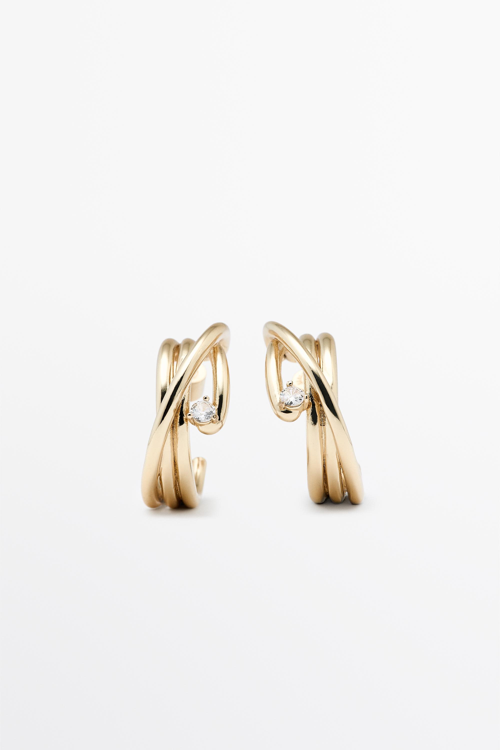 Shimmery hoop earrings — Golden