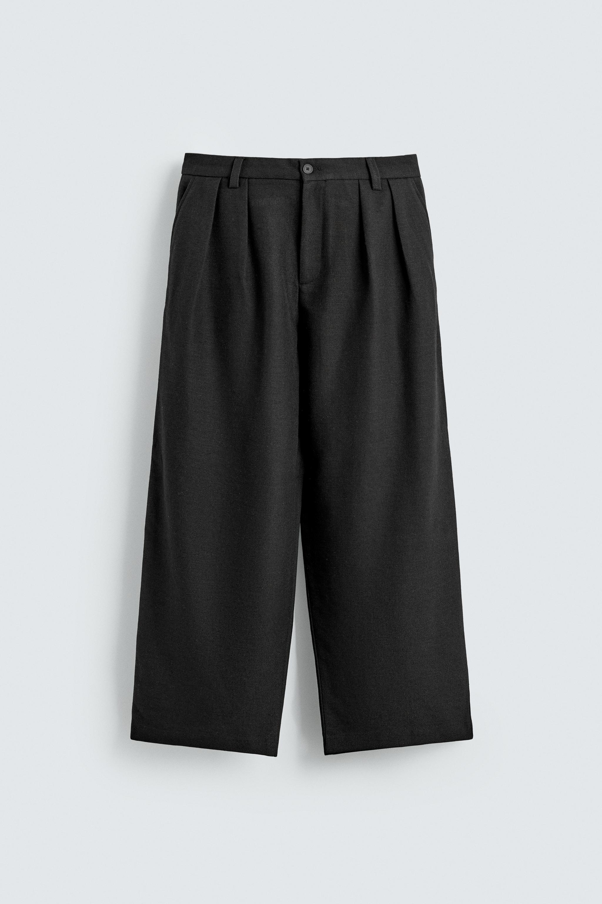 PLEATED RELAXED FIT PANTS