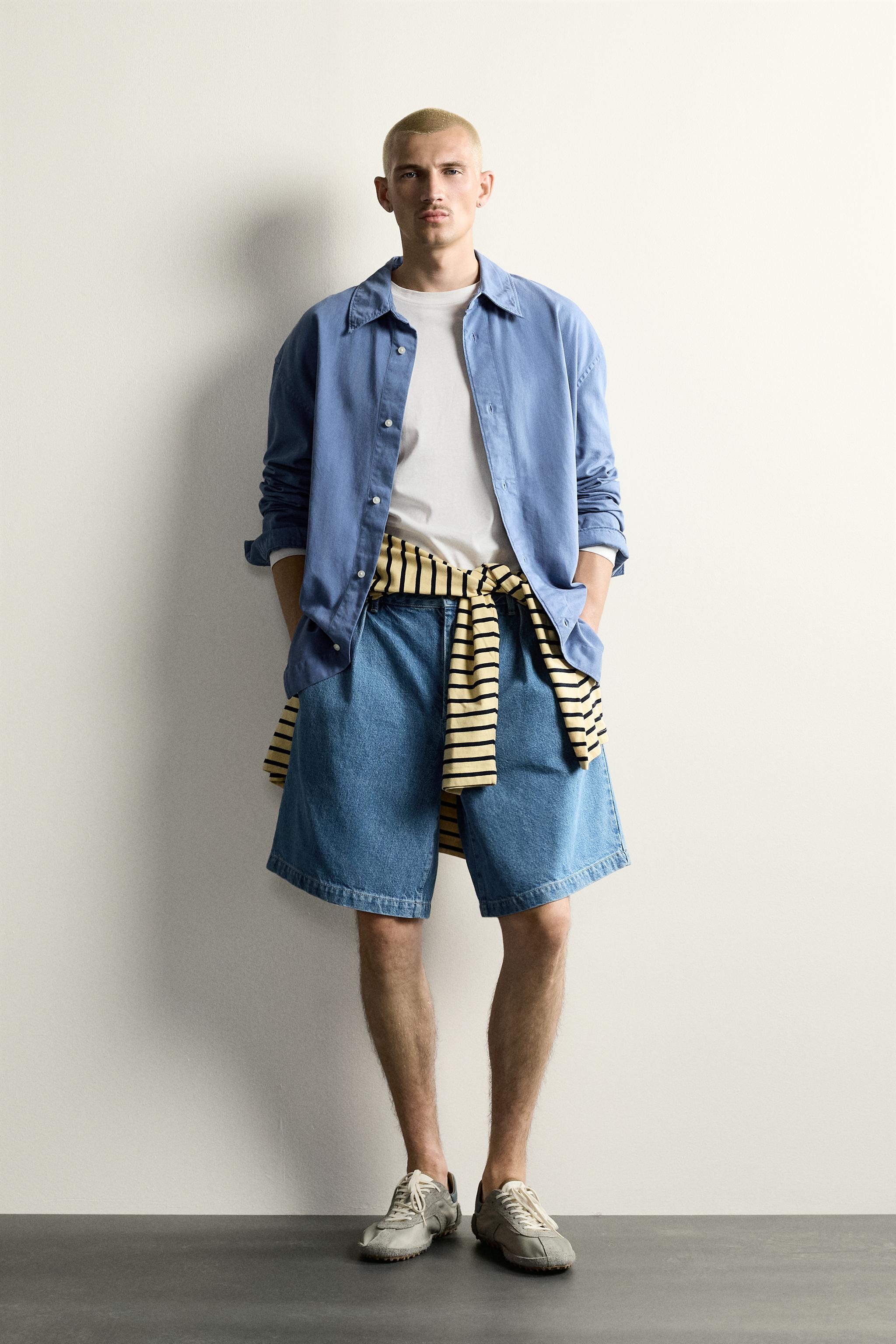 RELAXED FIT PLEATED DENIM CHINO SHORTS