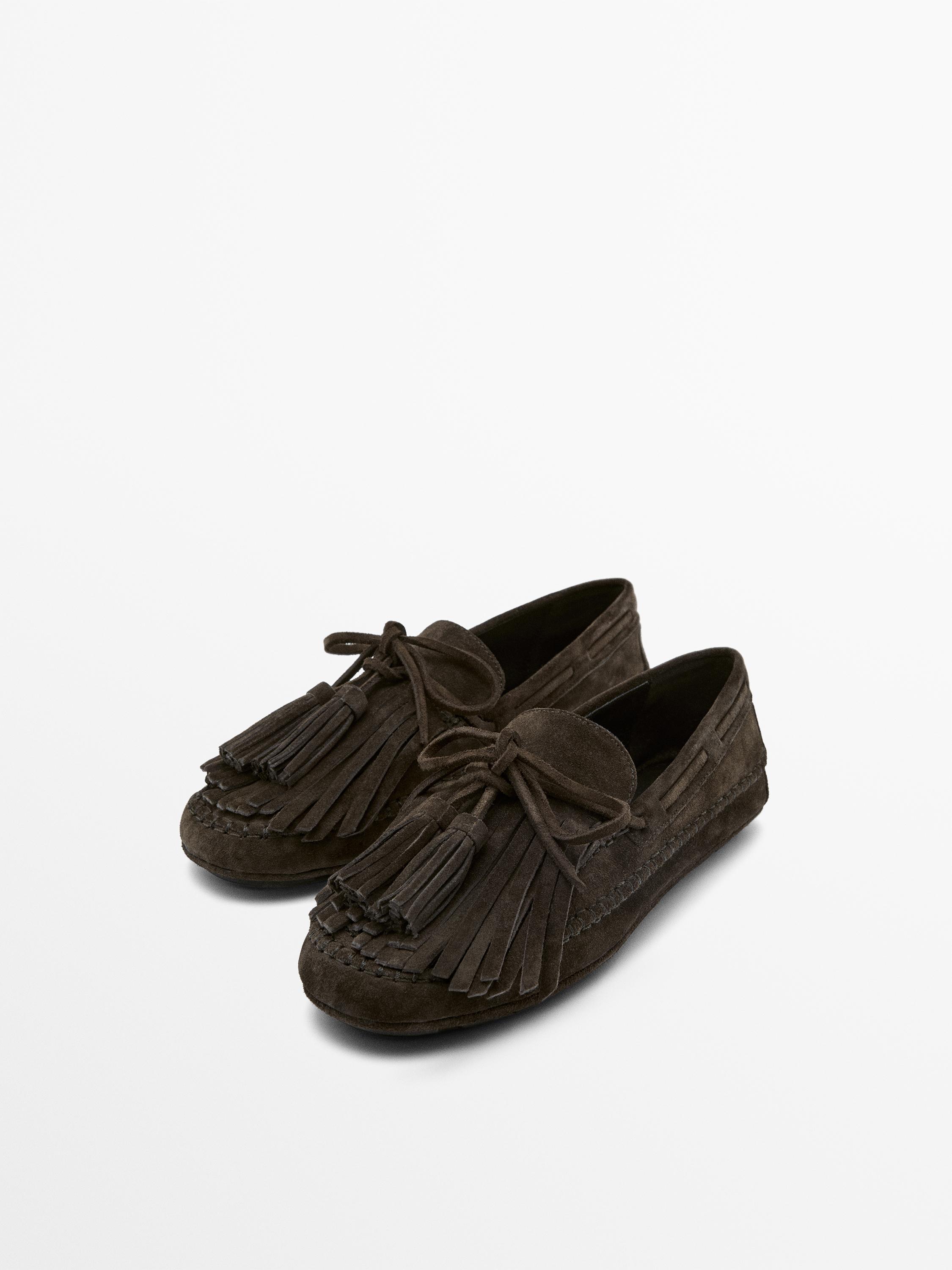 Split suede loafers with fringing and tassels