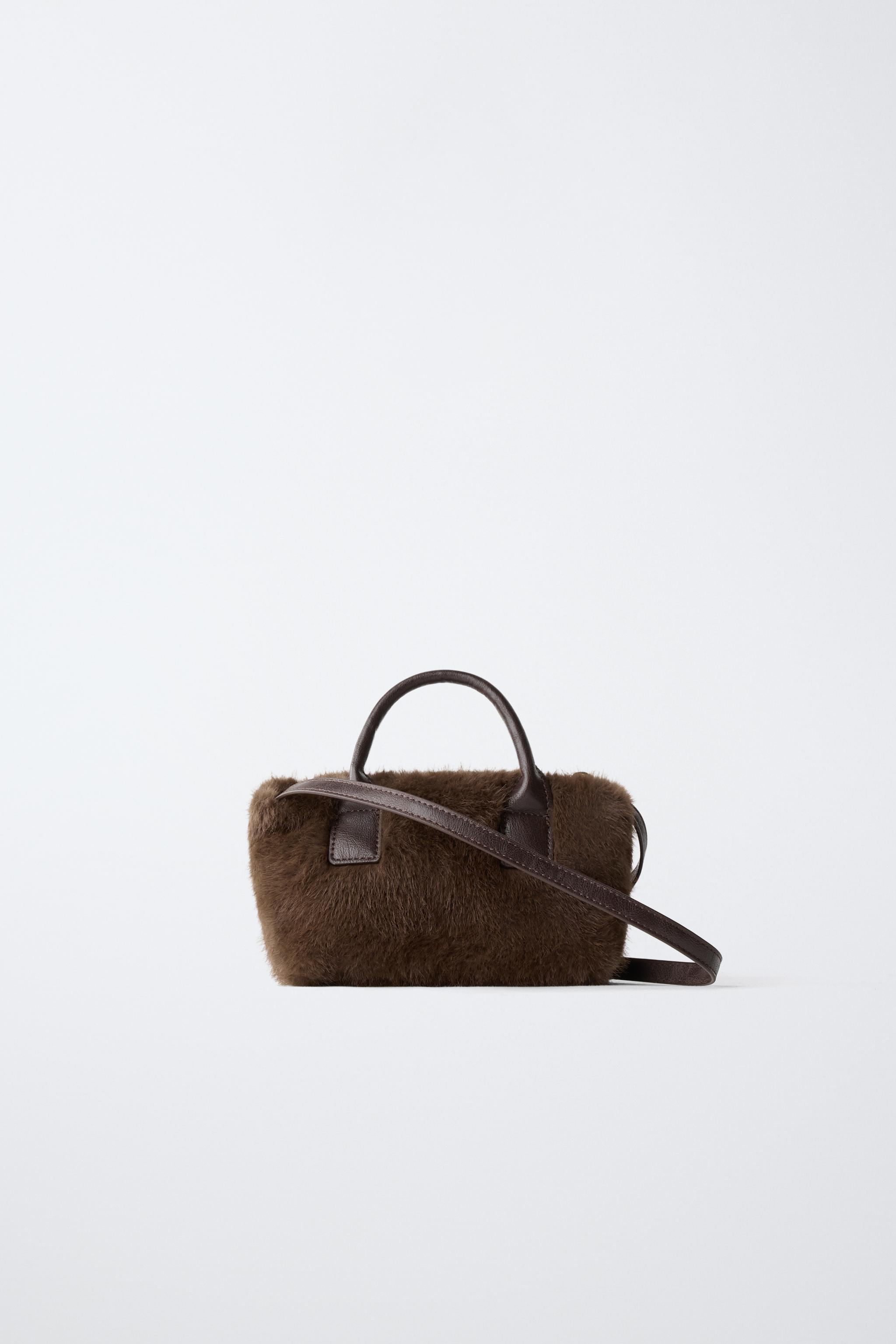 SAC BANDOULIÈRE EFFET FOURRURE AVEC CHARMS