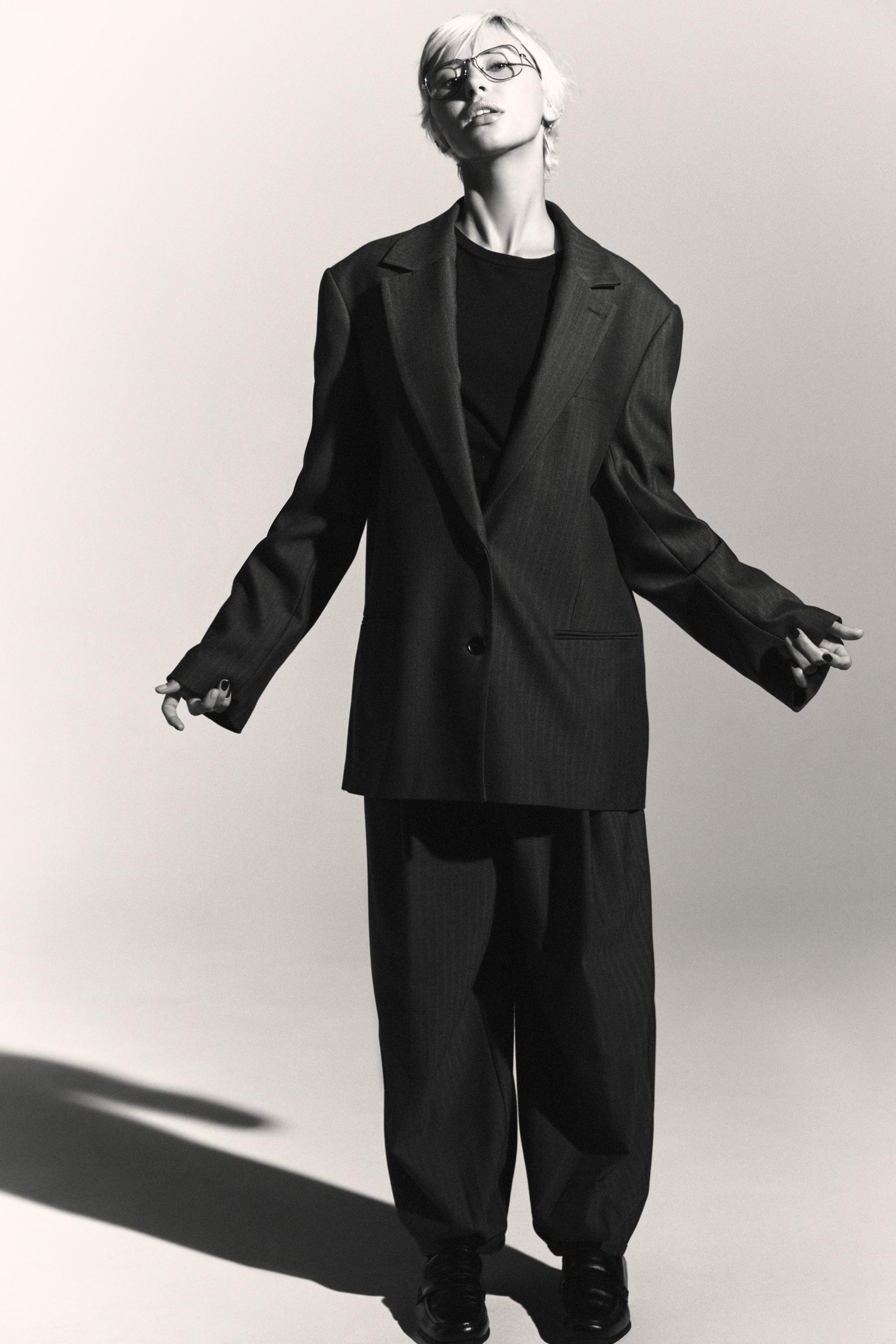 VESTE OVERSIZE À BOUTON MULTIPOSITION