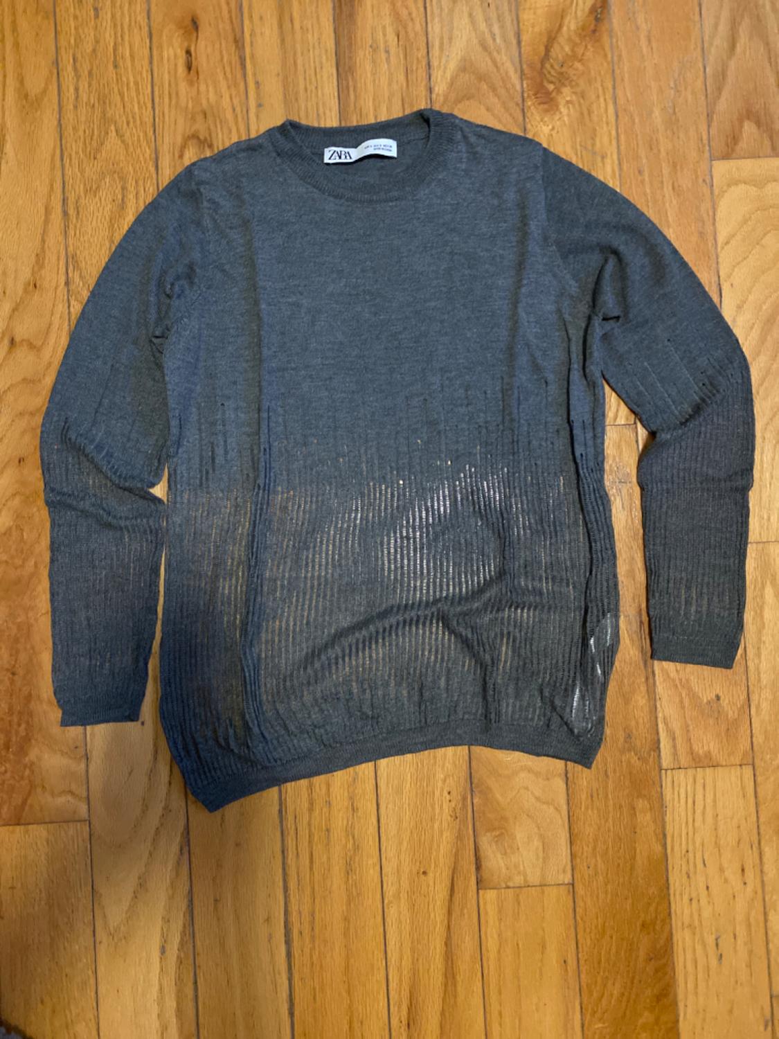 KNIT SWEATER WITH RIPS