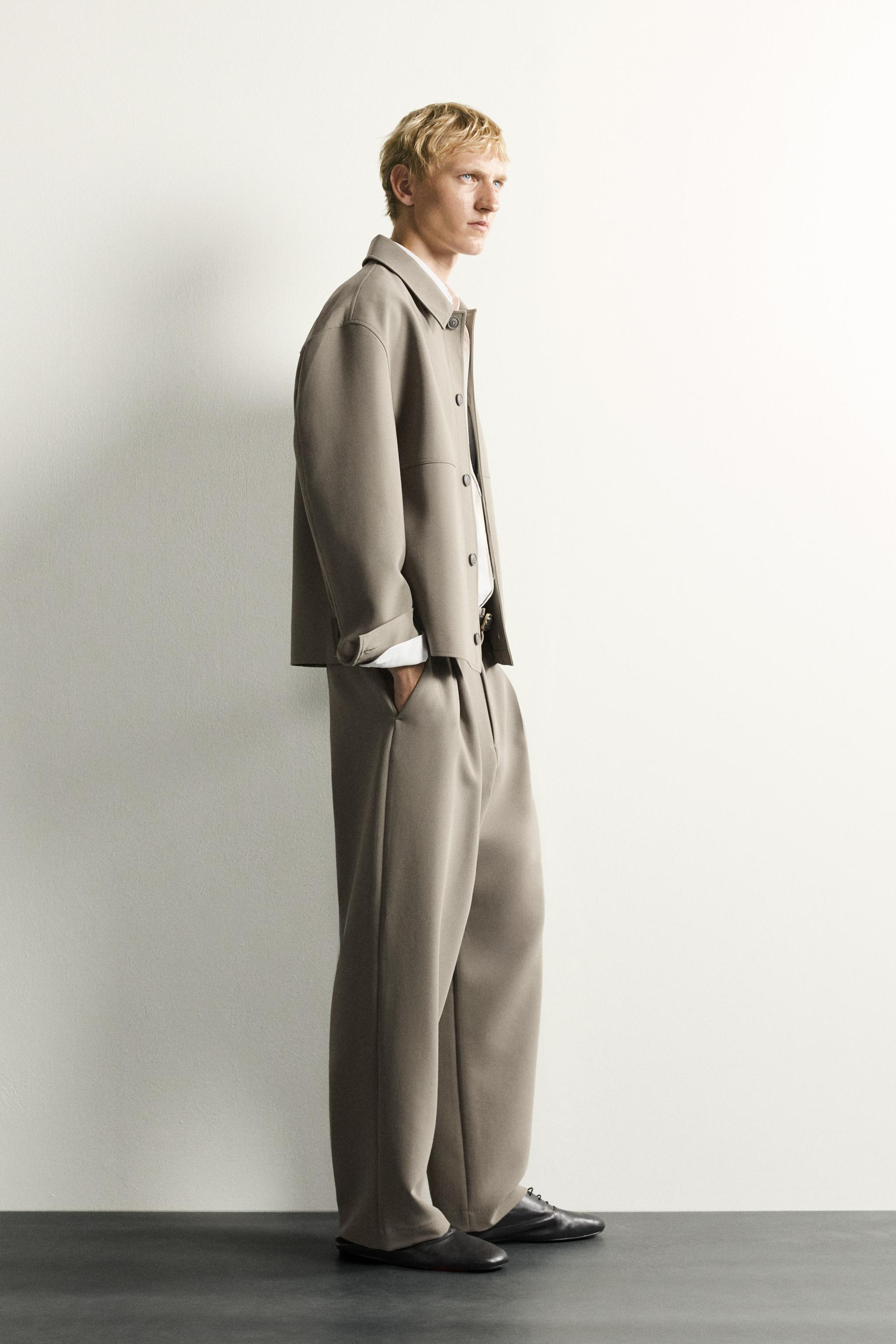 RELAXED FIT PLEATED PANTS